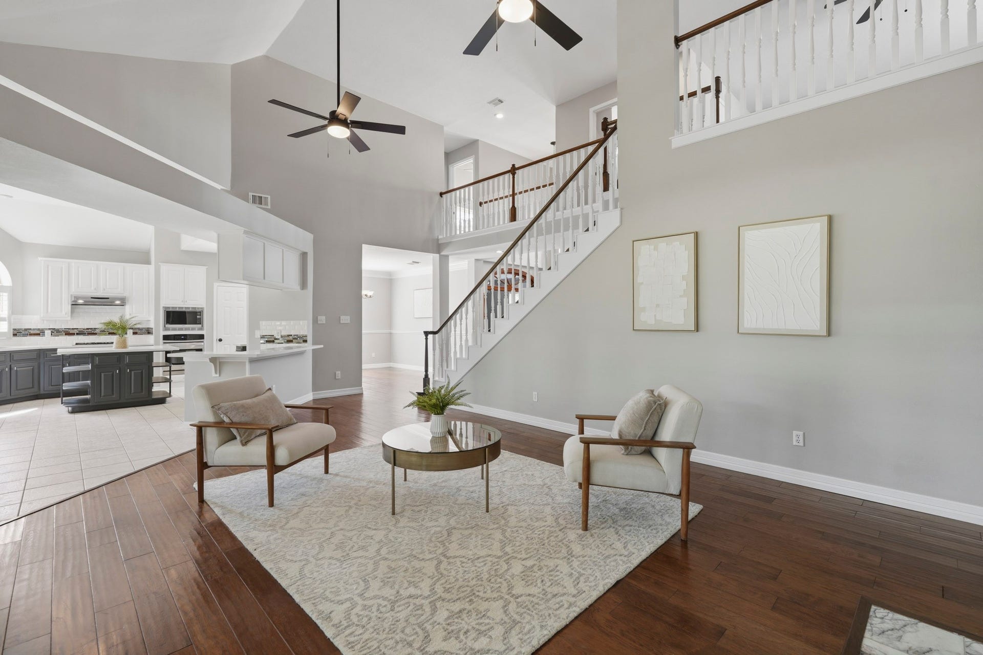 Look at the natural light in this home with high ceilings throughout the family and foyer