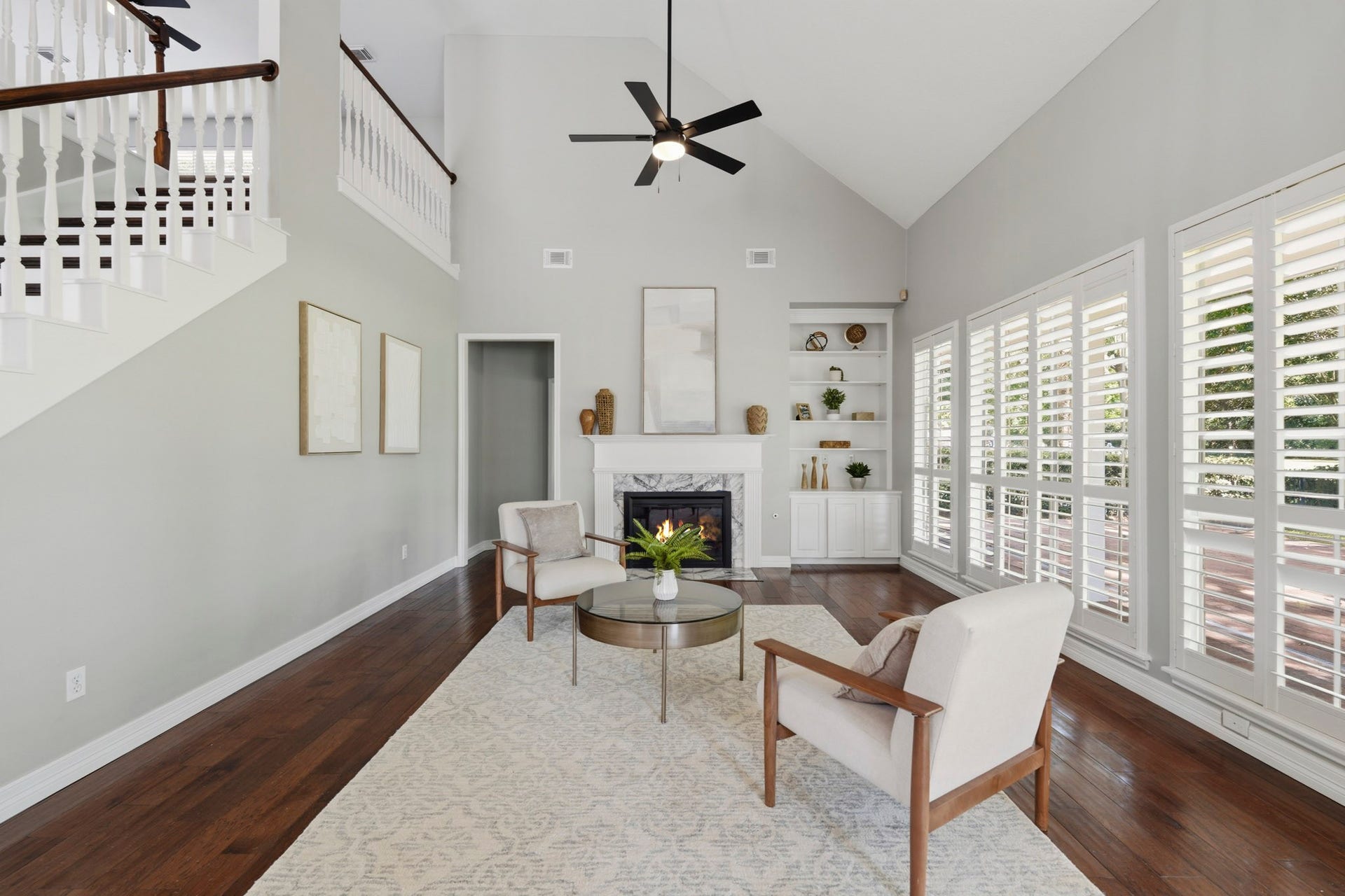 Views of the golf course and paved back patio from the family room complete with built-ins!