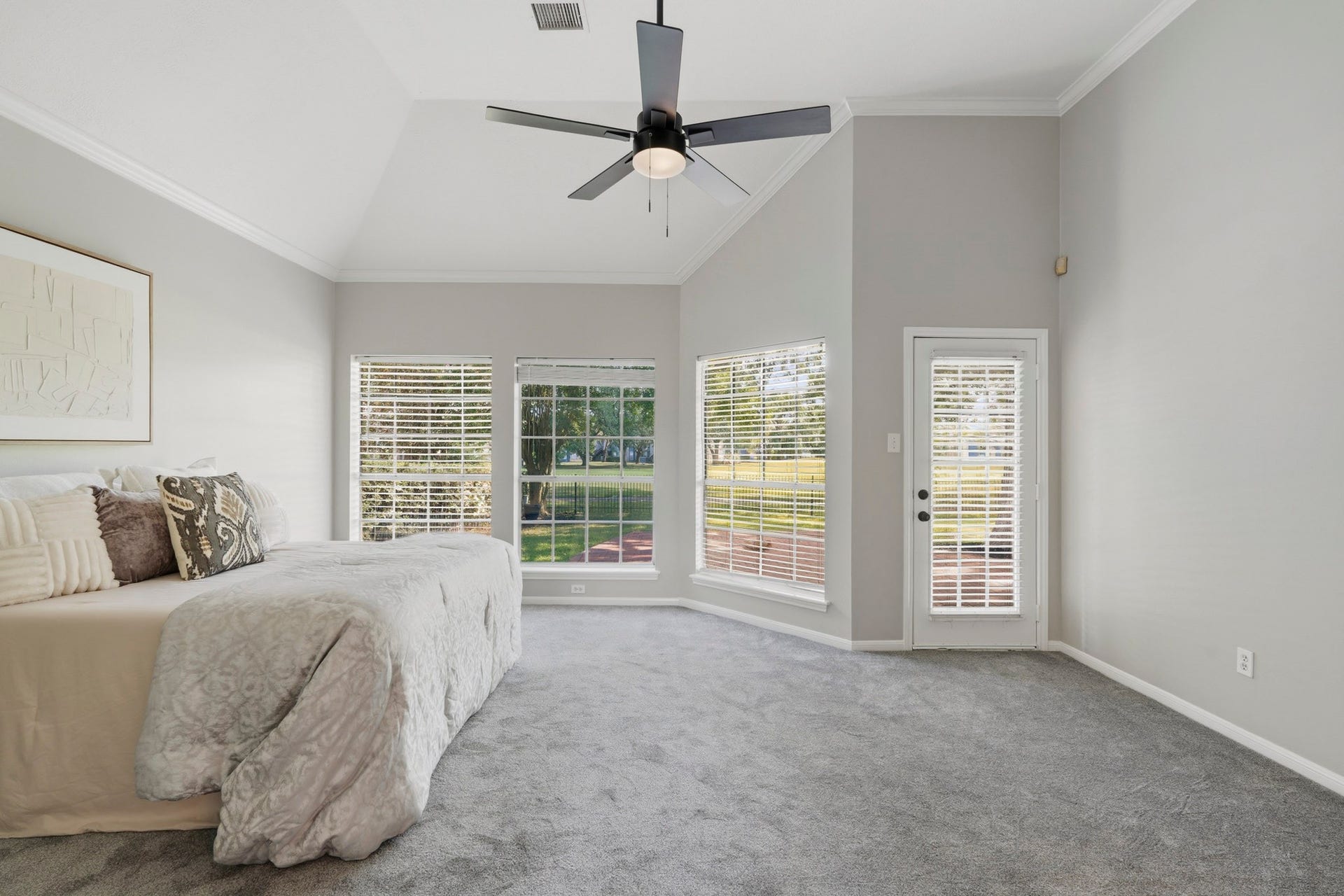 This home is set in a park-like setting with the mature trees just outside the windows.