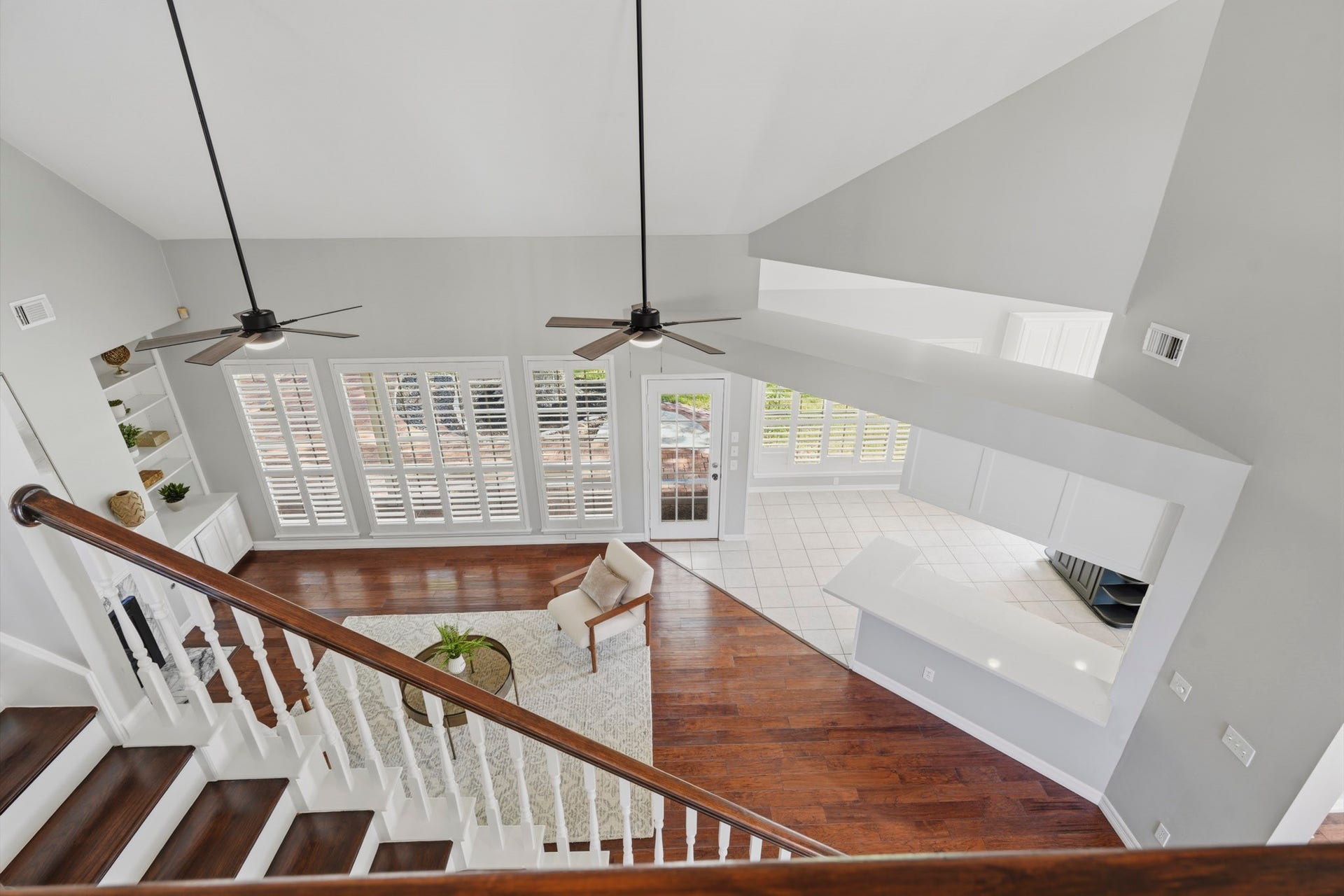The open concept from the game room allows for so much light and height.