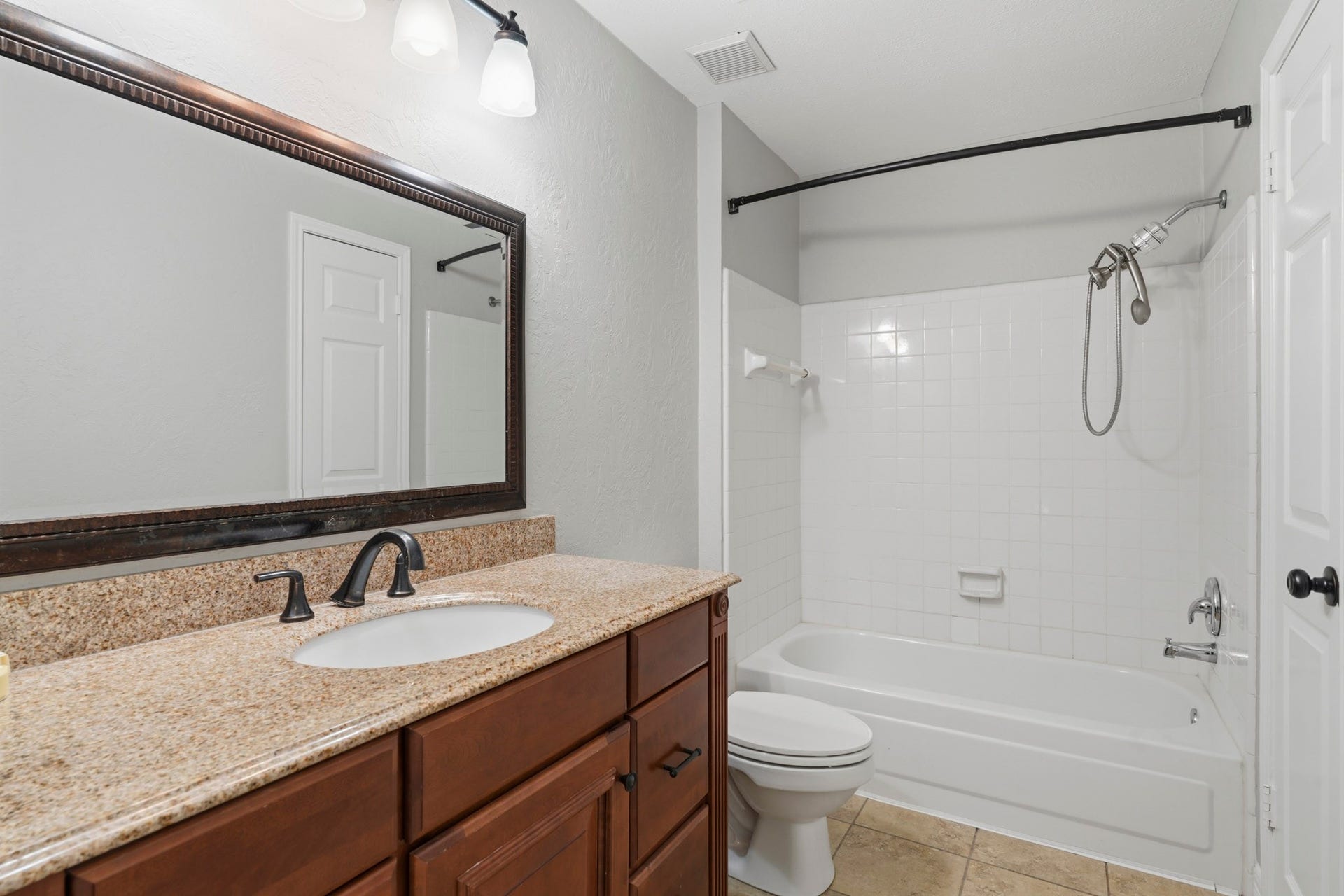 Secondary bath upstairs.