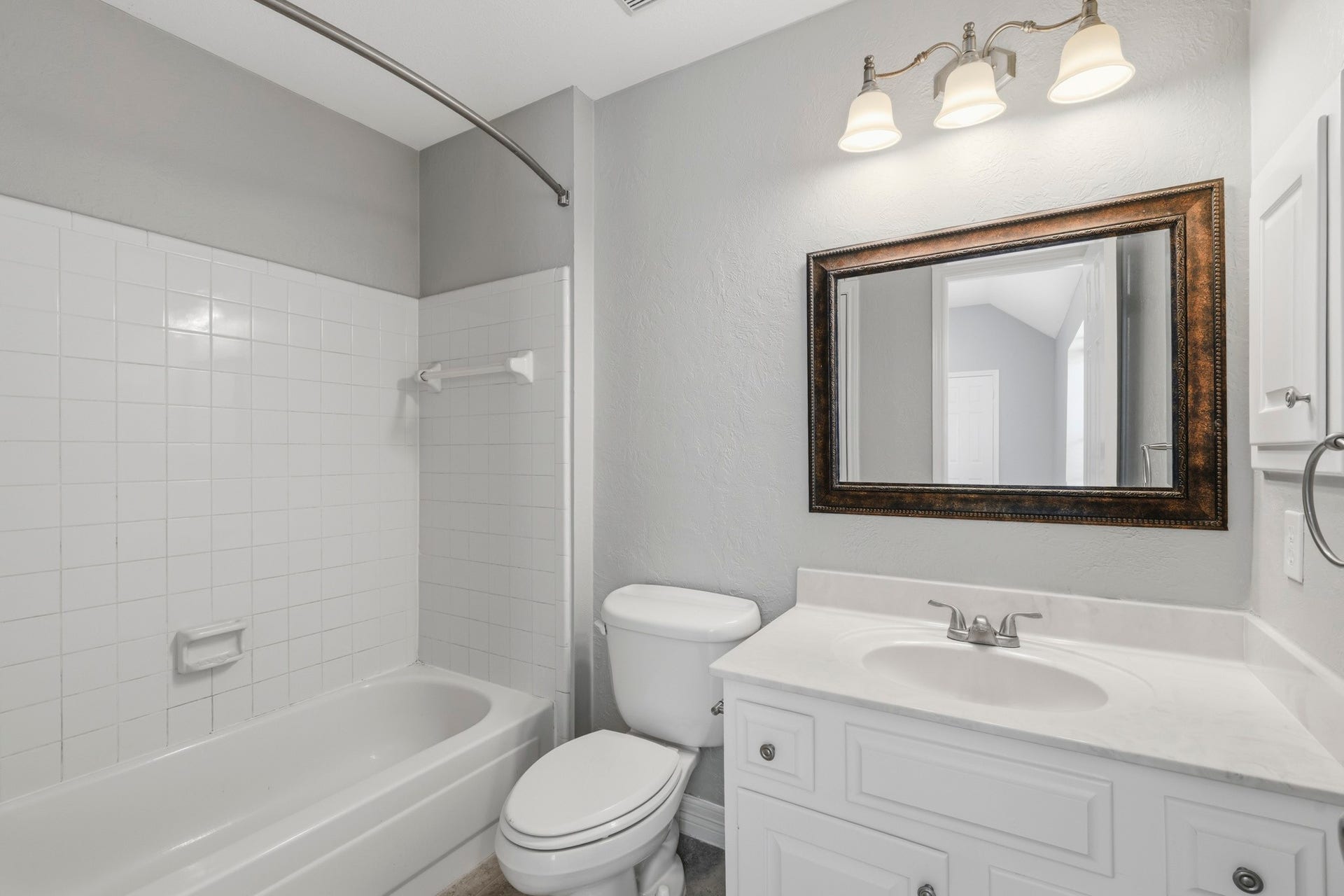 3 fulls baths in the home - en-suite in one bedroom upstairs.