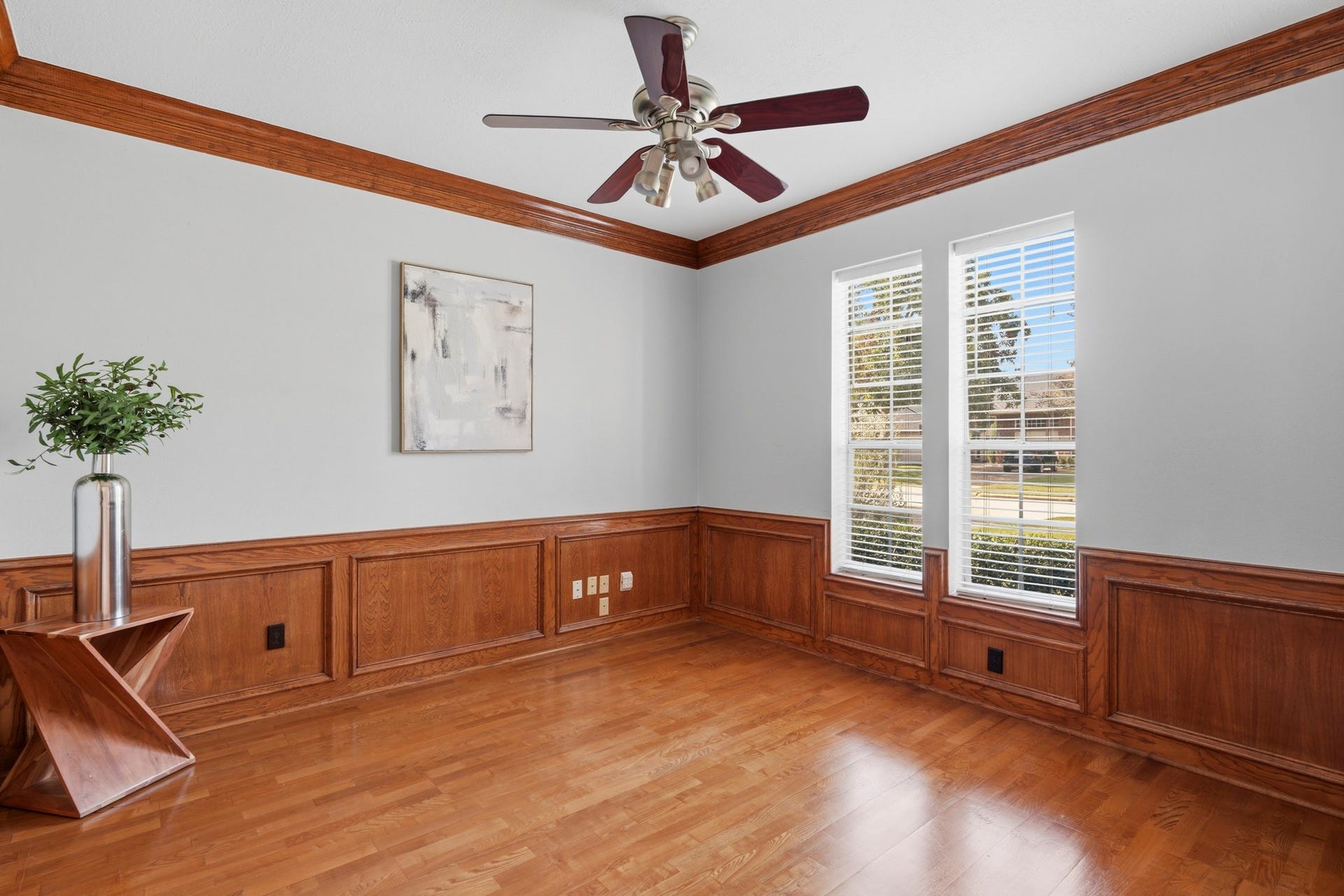 Executive office as you enter the home complete with wood paneling from the original design.