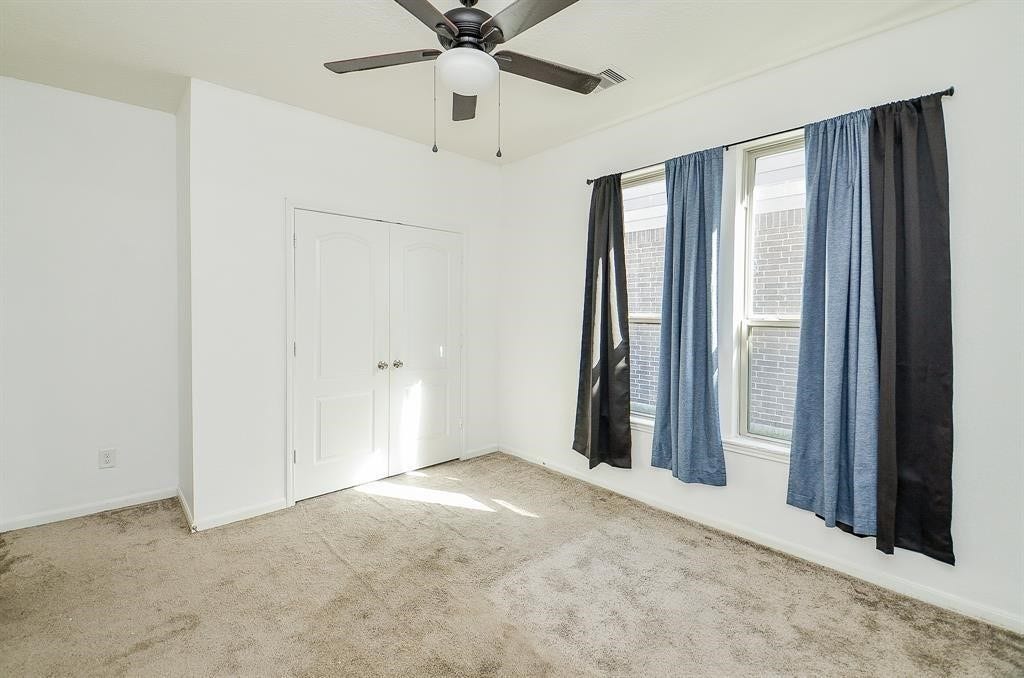 25410 Champion Ridge Court, Katy, TX 77493 Bedroom with Ceiling fan