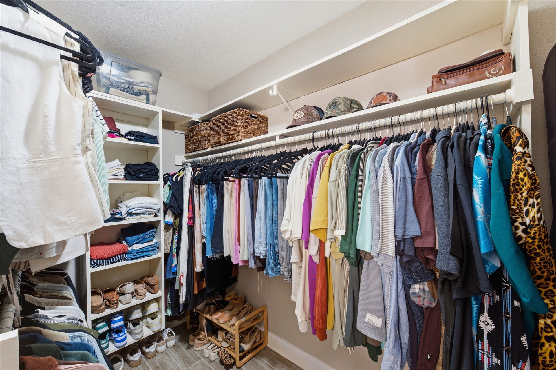 2211 Kinbrook Drive, Houston, TX 77077 Generously sized primary walk-in closet with ample storage.