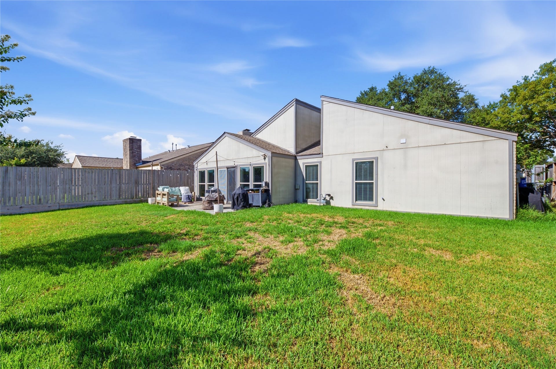 2211 Kinbrook Drive, Houston, TX 77077 This backyard is the perfect canvas for creating your dream outdoor living space.