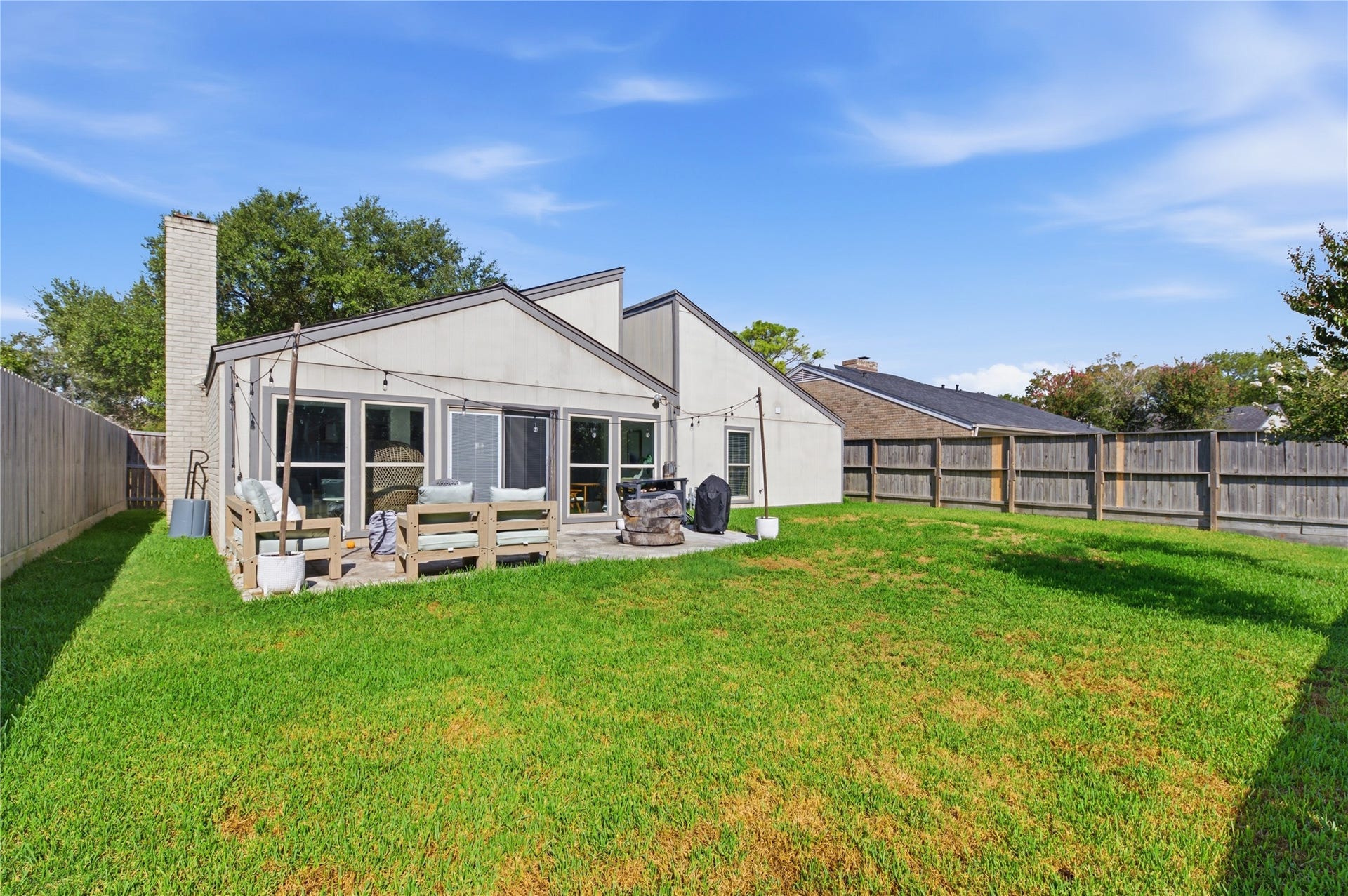 2211 Kinbrook Drive, Houston, TX 77077 Sprawling backyard offering endless space for outdoor entertaining.