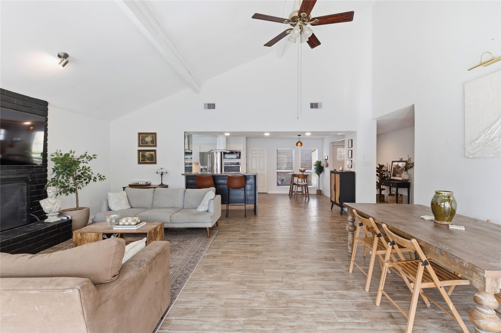 2211 Kinbrook Drive, Houston, TX 77077 Expansive living and dining combination built for easy entertaining.