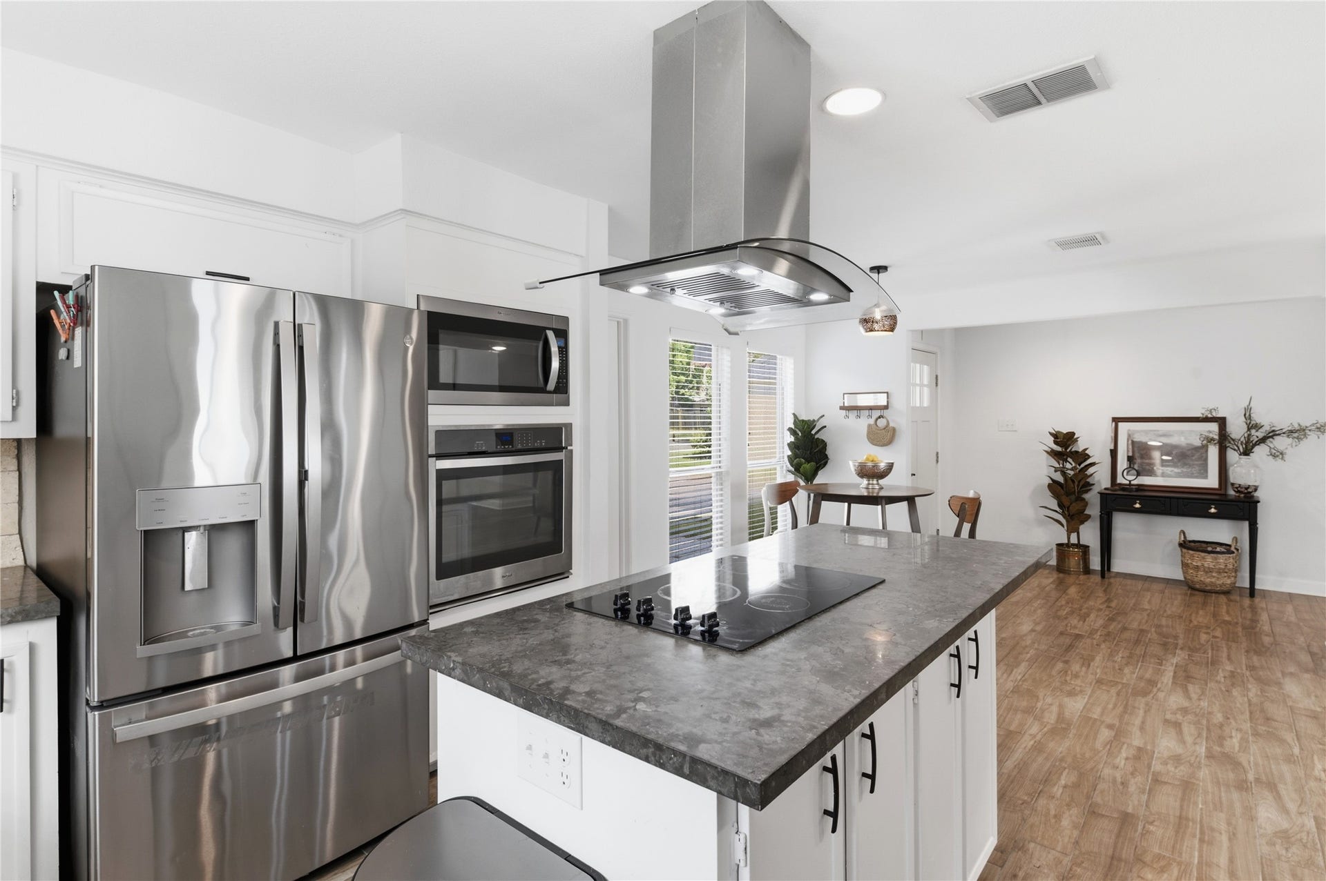 2211 Kinbrook Drive, Houston, TX 77077 Right off the kitchen is a dedicated breakfast nook, perfect for everyday meals.