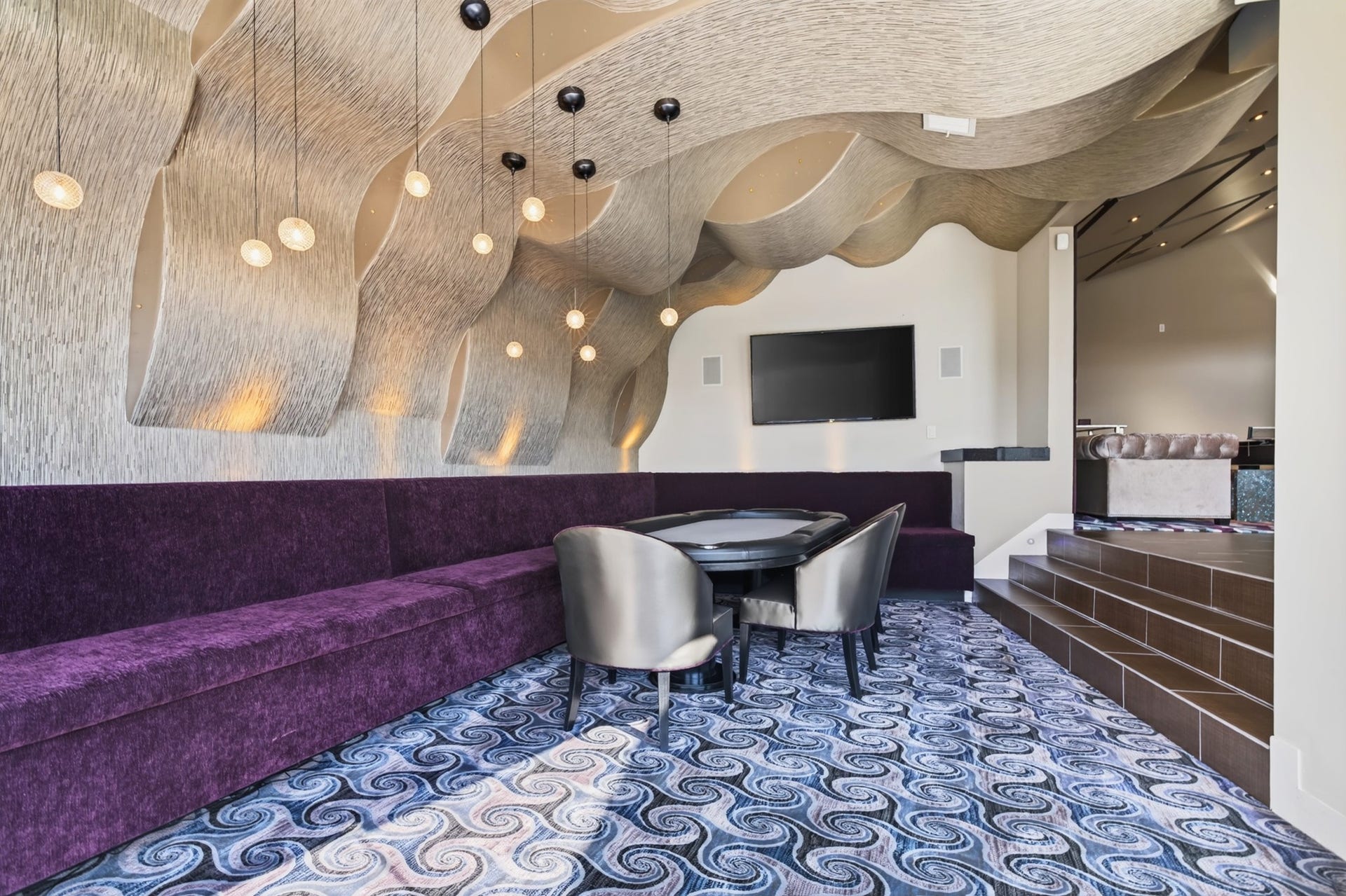 Game room provides generous space for billiards, recreation and casual gatherings.