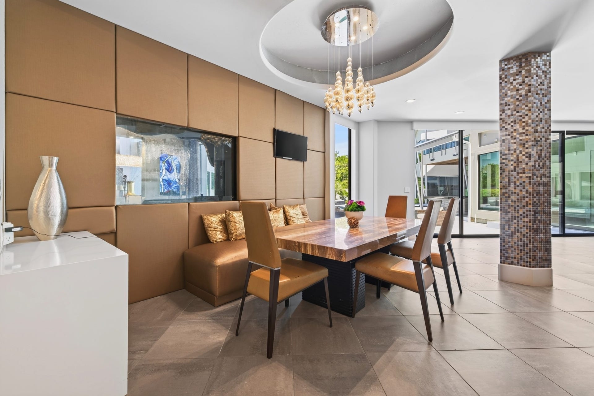Integrated appliance wall and extensive custom cabinetry complement the sophisticated kitchen design.