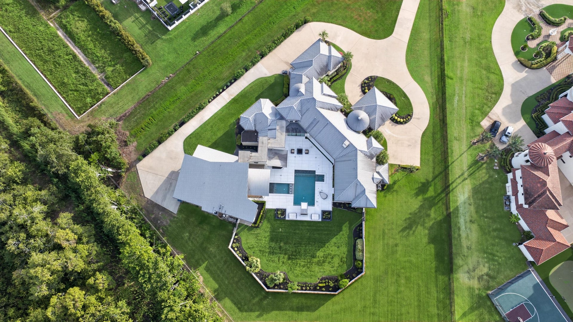 Birdseye elevation showcases the homes contemporary architecture and substantial footprint.