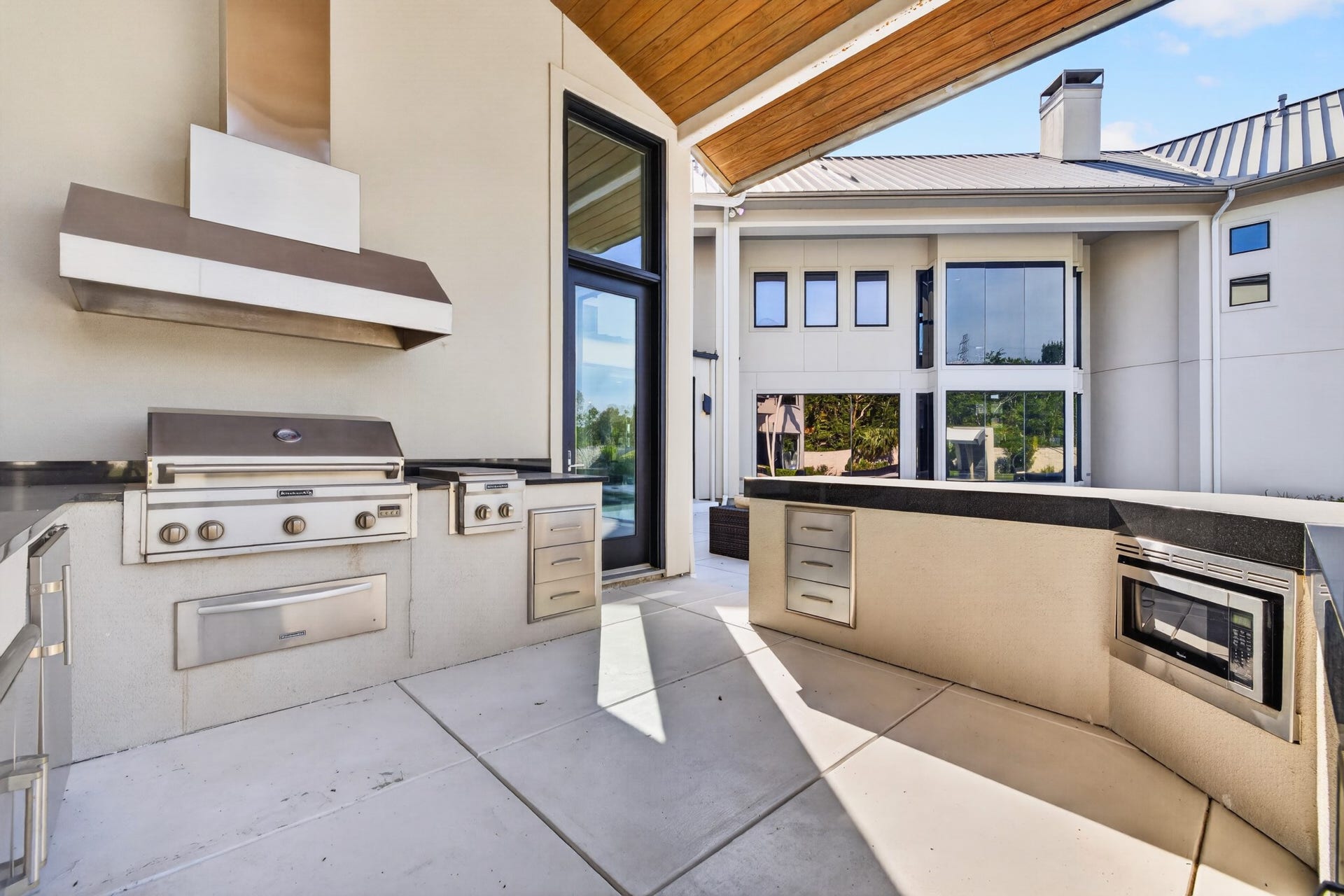 Well-appointed outdoor kitchen makes year-round entertaining effortless.