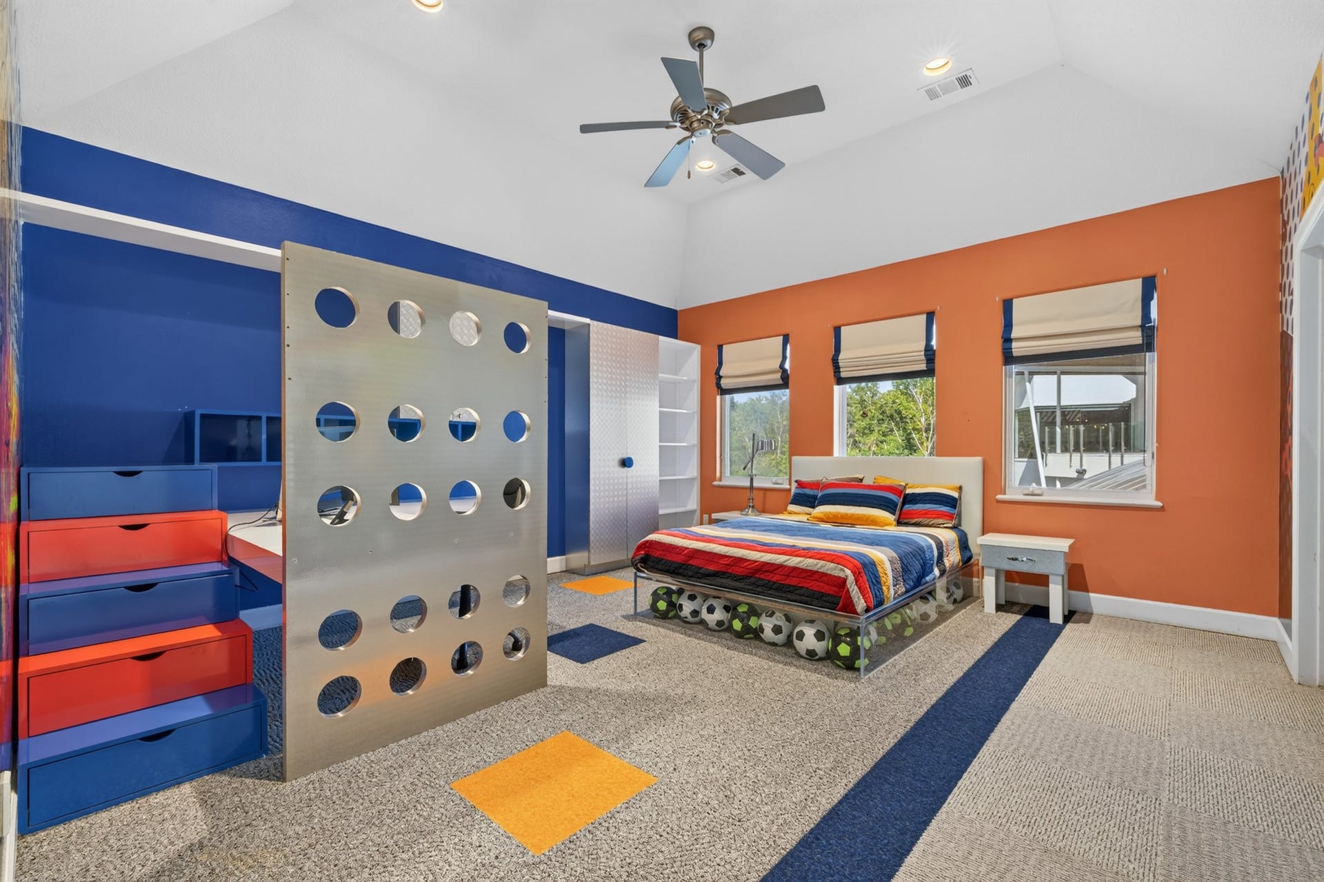 Distinctive secondary bedroom features abundant natural light and a playful contemporary design.