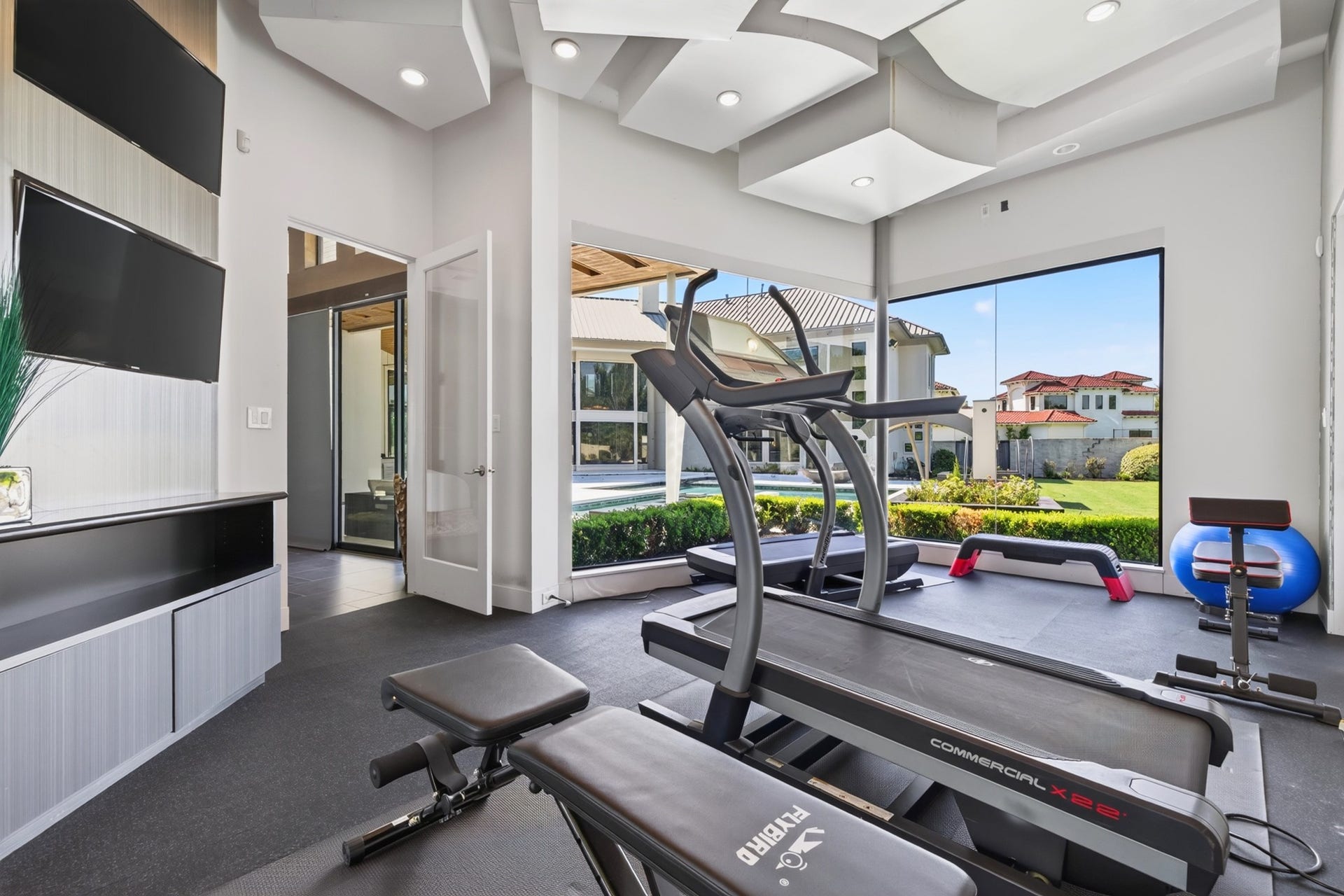 Dedicated fitness room allows for convenient workouts from the comfort of home.
