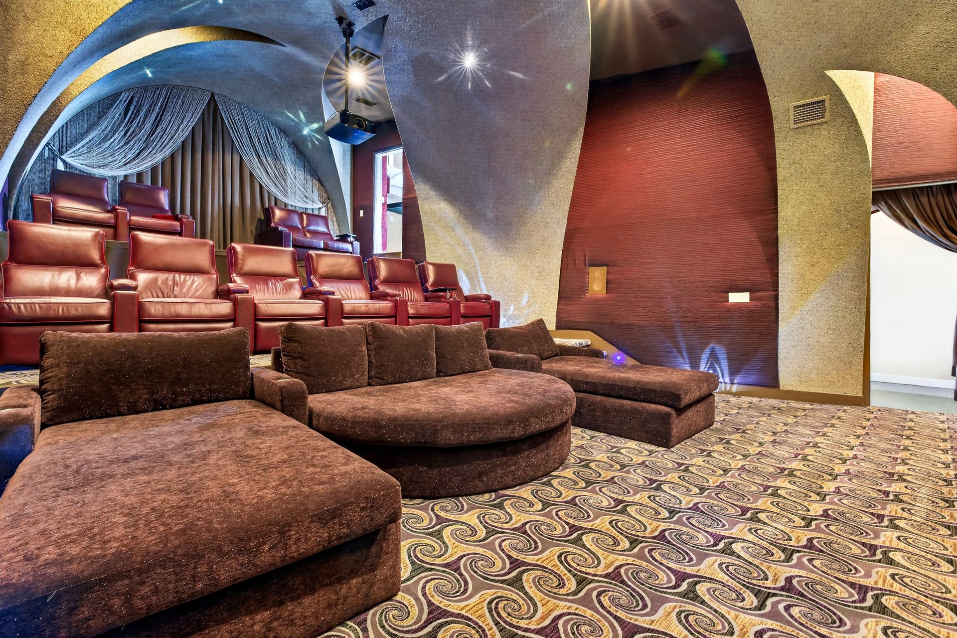 Private home theater creates an immersive setting for movie nights and entertaining.