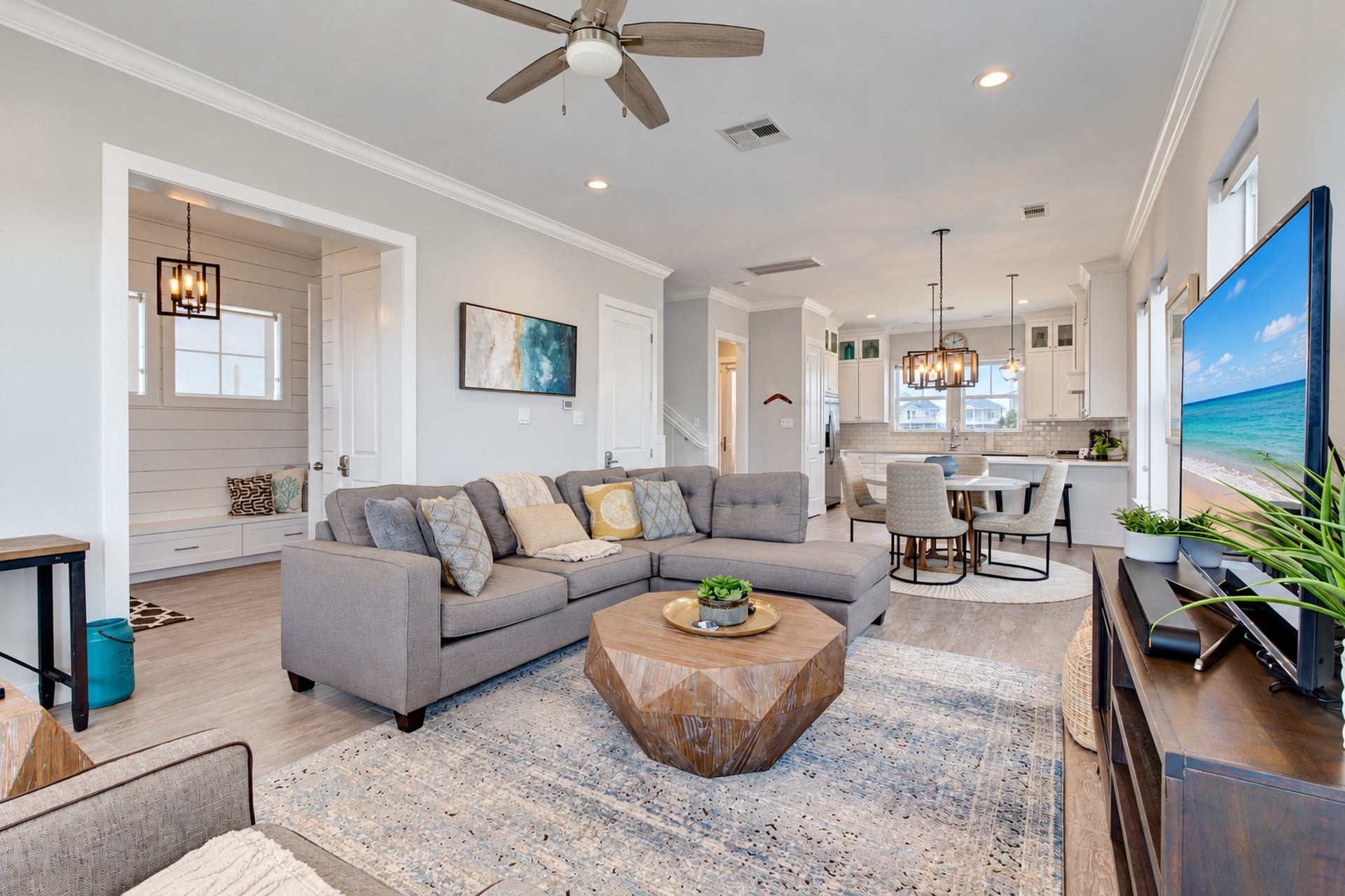 3802 Abalone Road, Galveston, TX 77554 Throughout the home you will find crown molding, recessed lighting, custom window treatments, wood look tile flooring & designer fixtures.