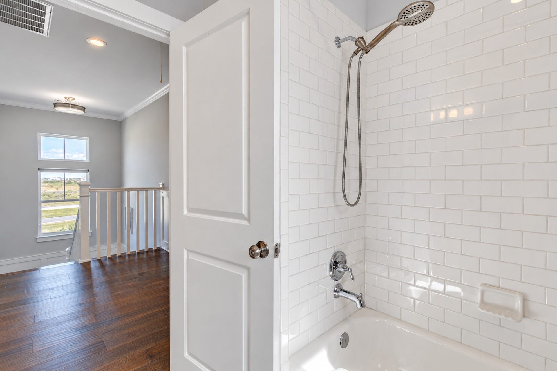 3802 Abalone Road, Galveston, TX 77554 This bathroom features a tub/shower combo.