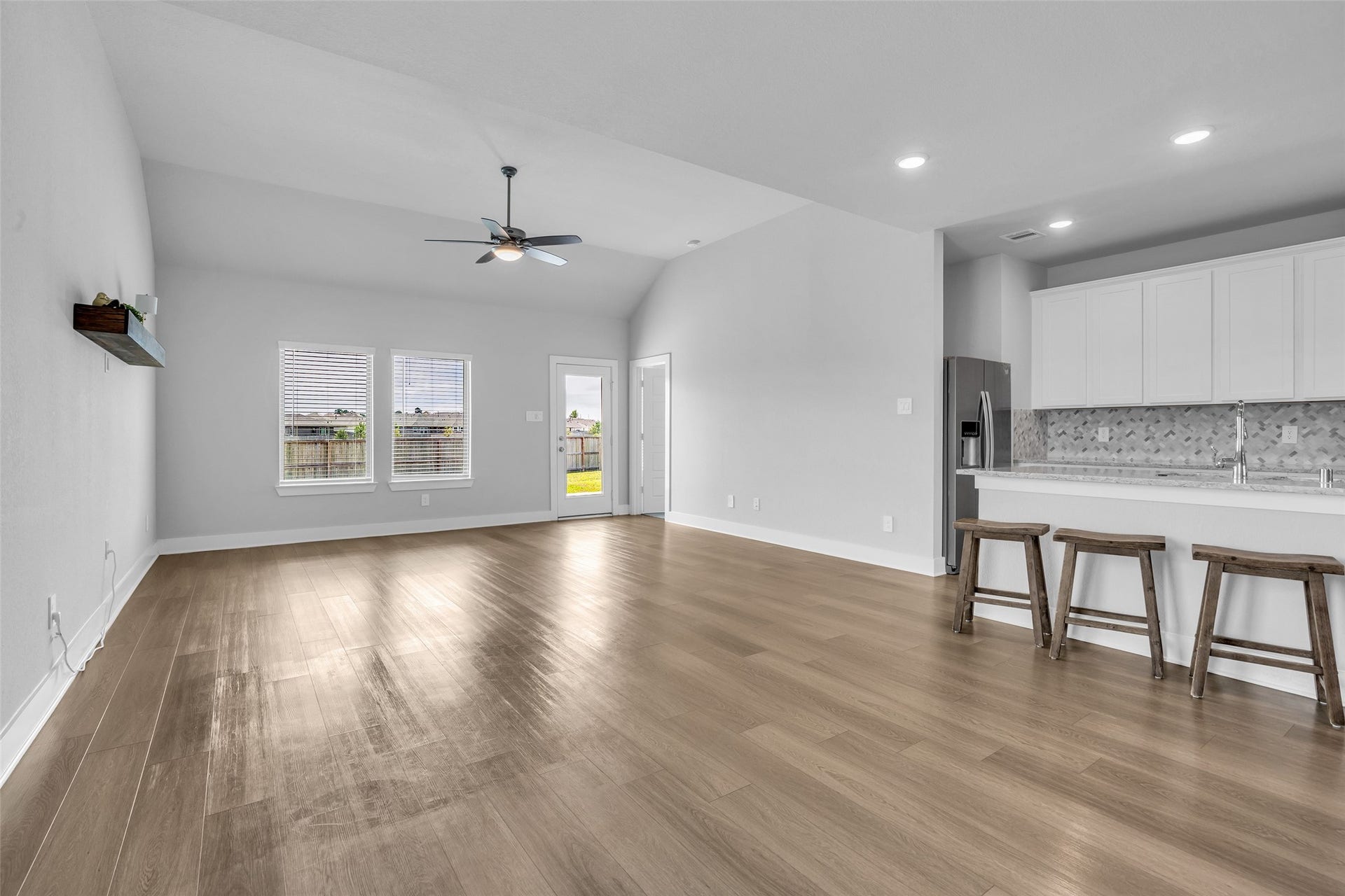 207 Alder Laurels Cove, Magnolia, TX 77354 Dining and living area