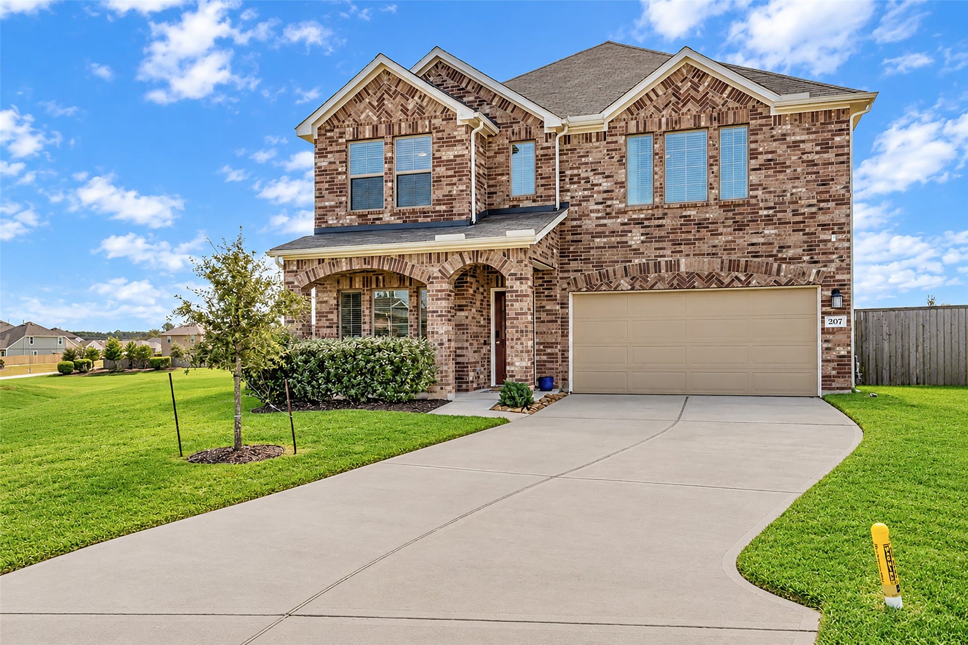 207 Alder Laurels Cove, Magnolia, TX 77354 Beautiful curb appeal and no neighbors on left side