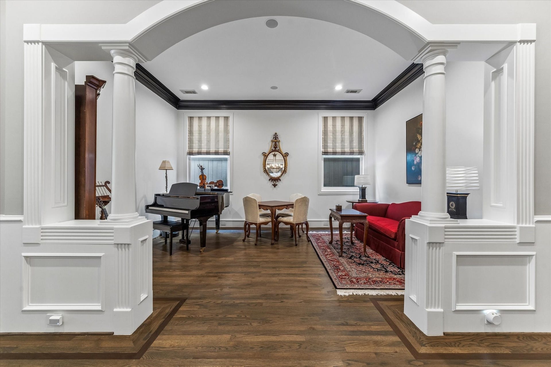 The formal living room, currently used as a piano room and spot for card games, could also make an ideal playroom!