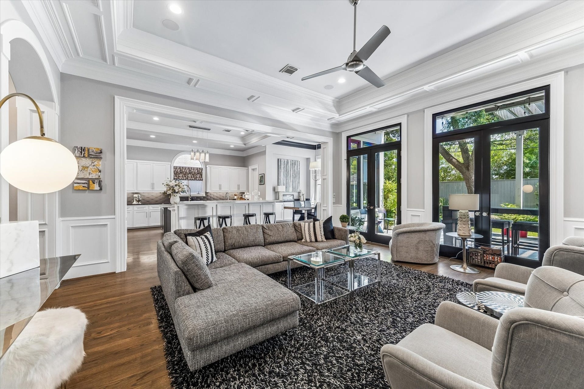 Alternate view of the family room looking toward the kitchen with direct access to the outdoor kitchen