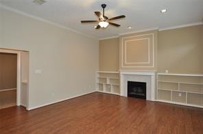 3129 Cedar Knolls Drive, Houston, TX 77339 Living room with fireplace and bookshelves