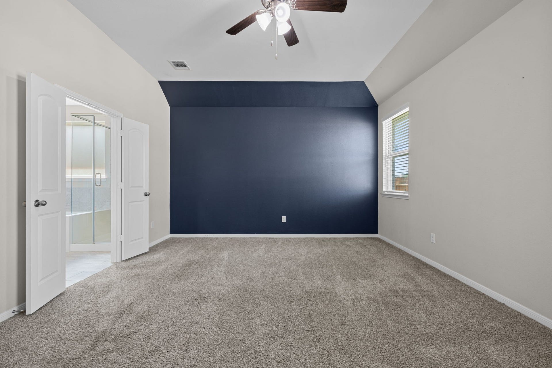 25615 Pinyon Hill Trail, Tomball, TX 77375 The primary is at the back of the home and split in this plan for ultimate privacy