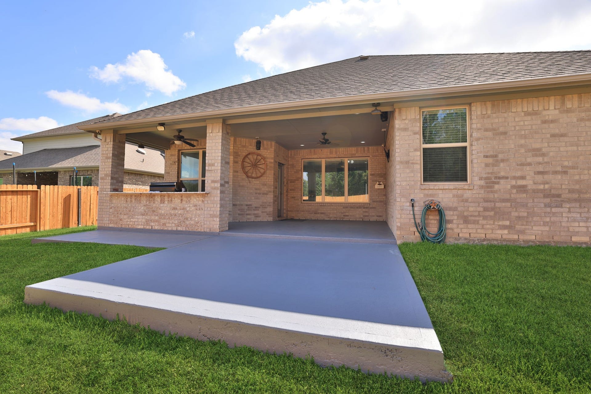 25615 Pinyon Hill Trail, Tomball, TX 77375 The patio extends out for more useable area. Play games or soak up the sun