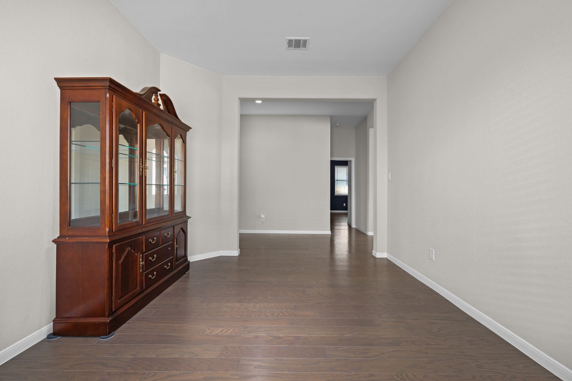 25615 Pinyon Hill Trail, Tomball, TX 77375 The view in the dining room looking out towards the walk way. There's another entrance directly into the kitchen.