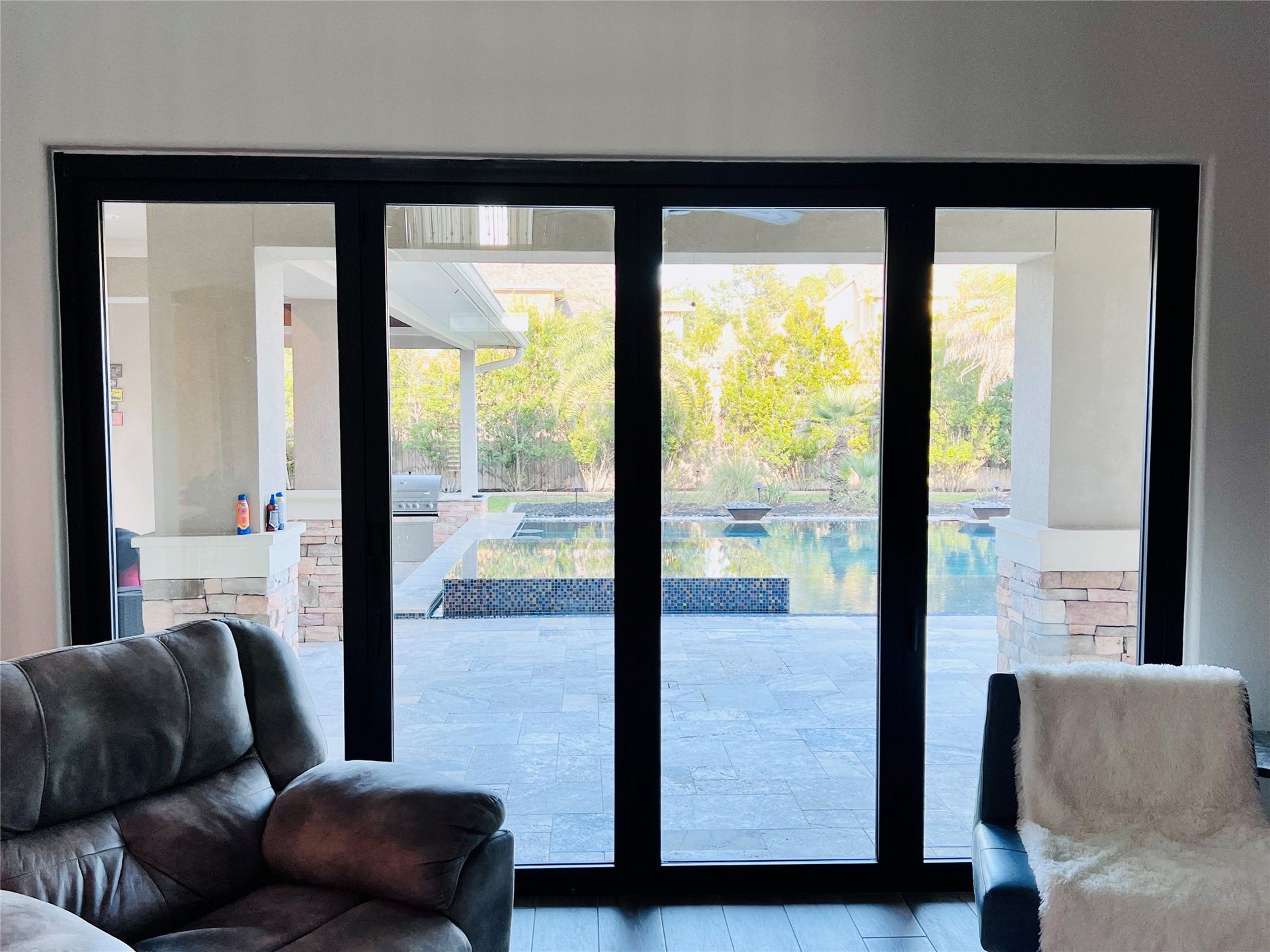 25014 Jennifer Heights Court, Spring, TX 77389 Bi-fold glass door opens to the patio