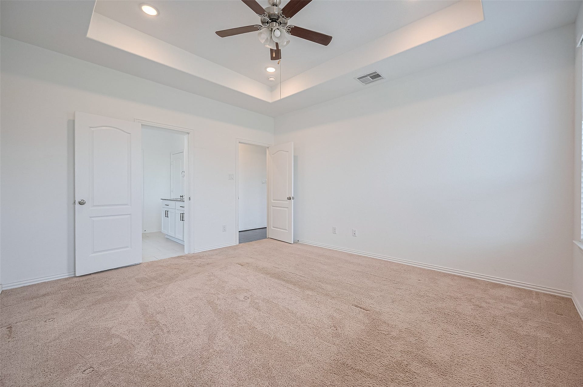 31326 Whitfield Court, Fulshear, TX 77441 Room features two doorways leading to a bathroom and walk-in closet.