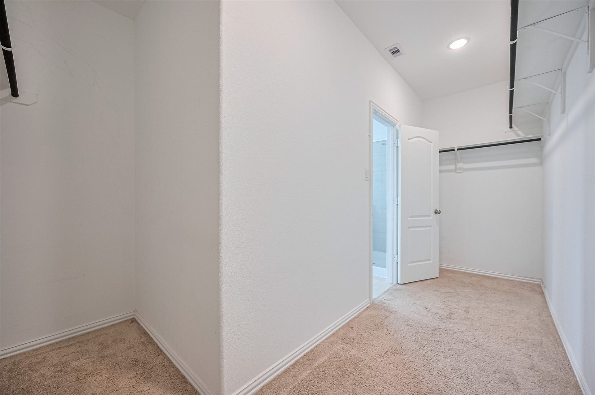 31326 Whitfield Court, Fulshear, TX 77441 An open door leads to an adjacent room, enhancing accessibility and convenience.
