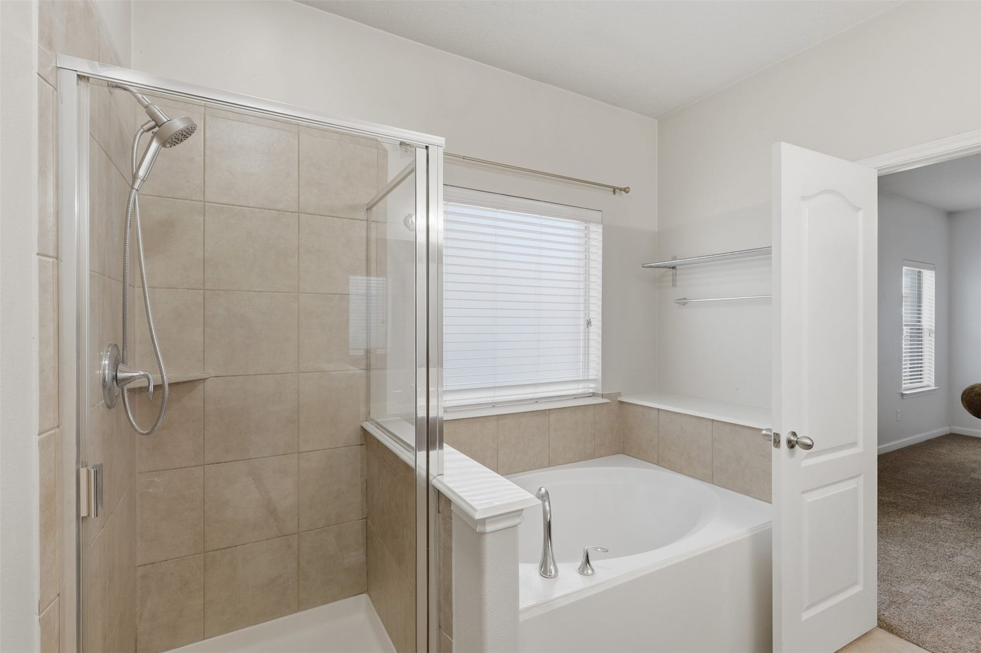 Primary En-Suite with a soaking TUB and custom SHOWER!