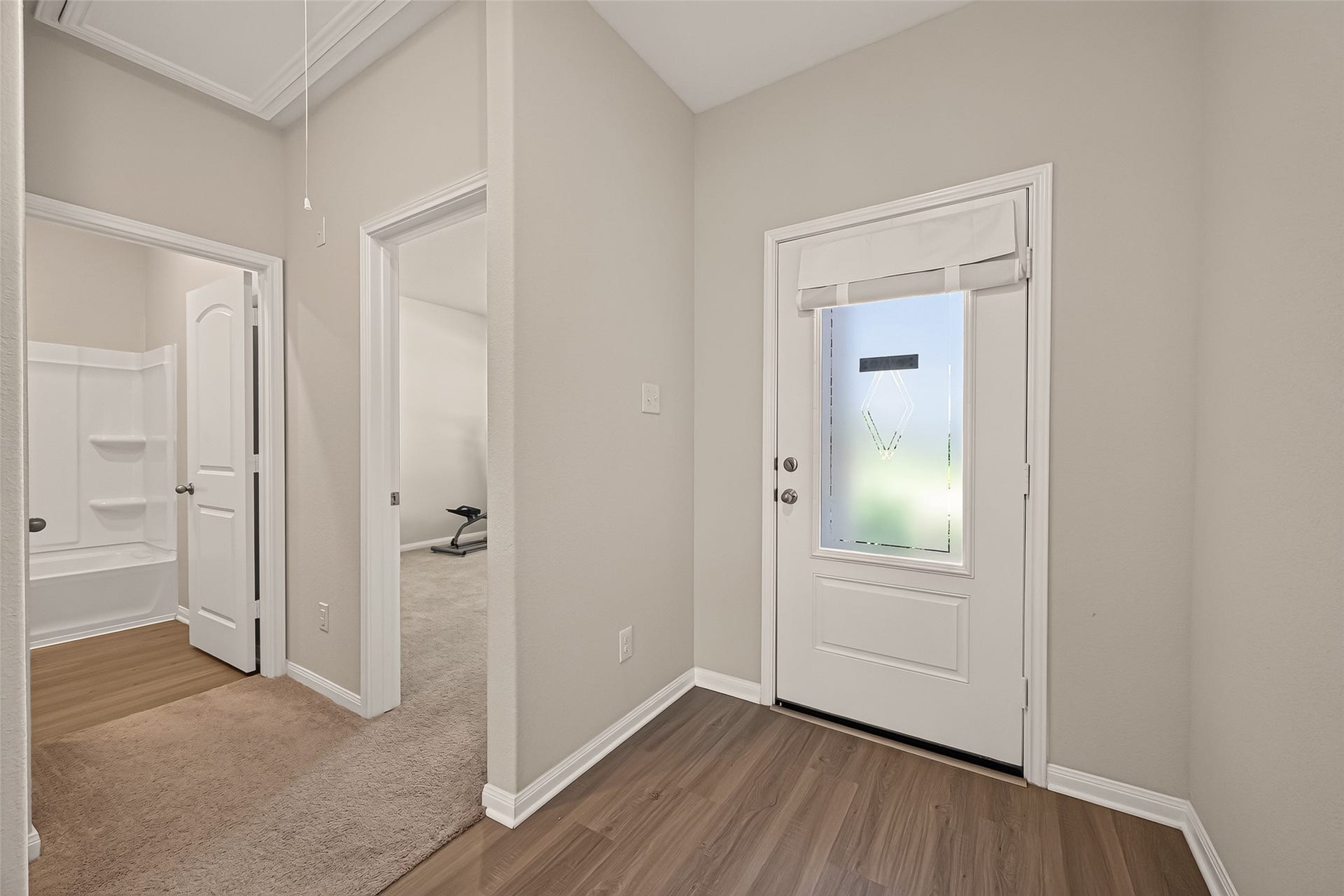 3205 Foresail Lane, Santa Fe, TX 77510 Pretty luxury vinyl plank flooring in entry