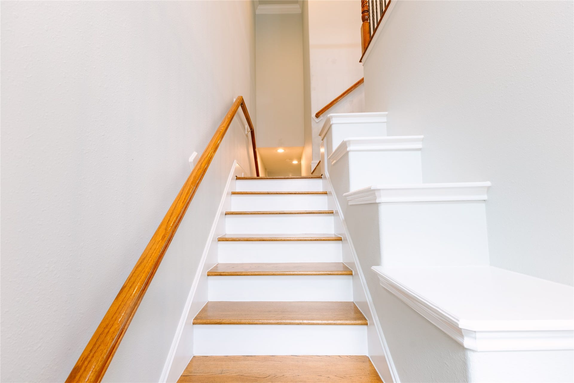 1710 Aden Mist Drive, Houston, TX 77003 Beautiful wood staircase with wrought-iron accents adds character and sophistication.