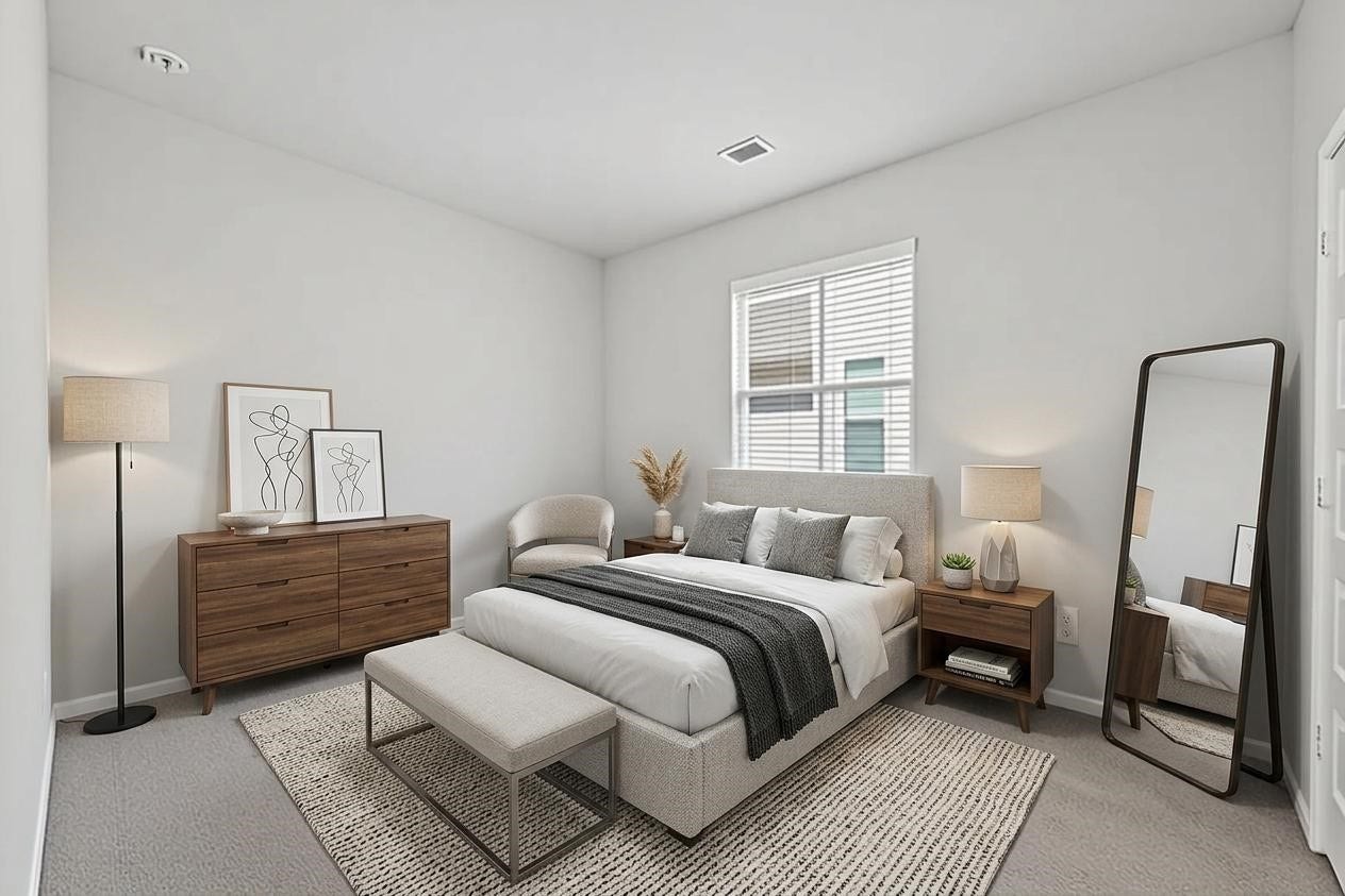 22409 Kinley Street, New Caney, TX 77357 This digitally staged photo showcases a serene, modern secondary bedroom with sleek furnishings, inviting decor, and abundant natural light, offering a glimpse of the tranquil home life you could enjoy.
