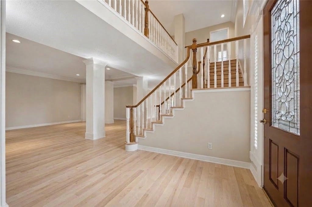 Entry. Virtual rendition with light colored hard wood floors.
