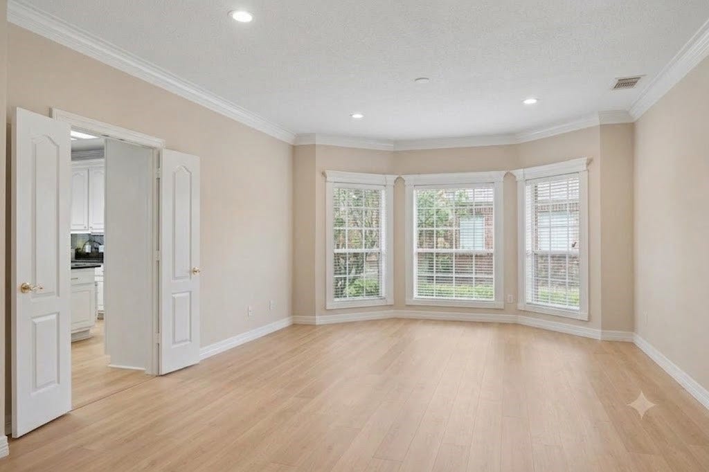 Dining room. Virtual rendition with light colored hard wood floors no light fixture, not curtains.