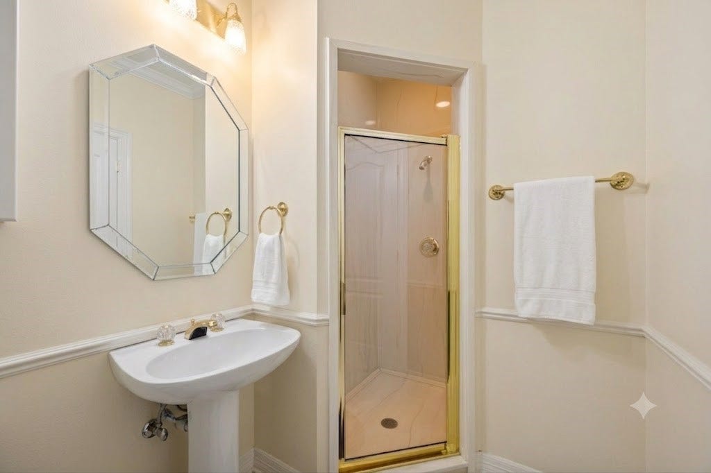 Downstairs full bathroom next to the study.