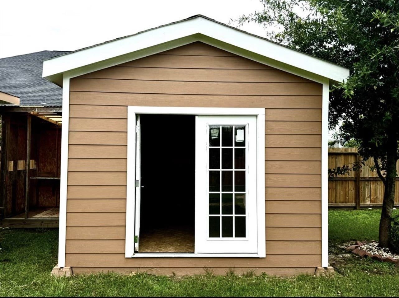 20319 Mountaindale Drive, Cypress, TX 77433 Additional storage space in the backyard. Fully enclosed space, perfect for a workshop or multi use.