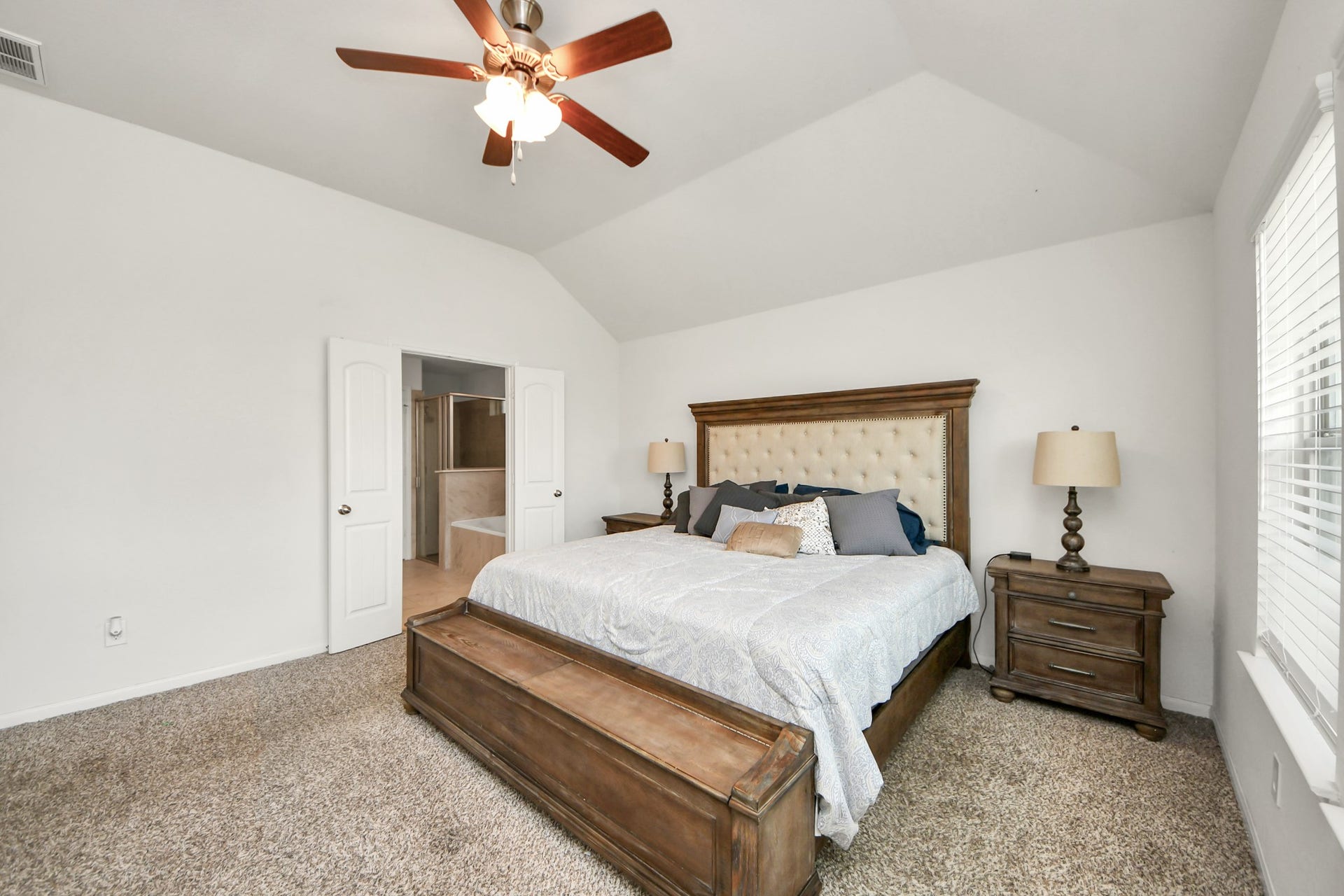 6226 Mason Way, Rosenberg, TX 77471 Primary bedroom showing restroom entry
