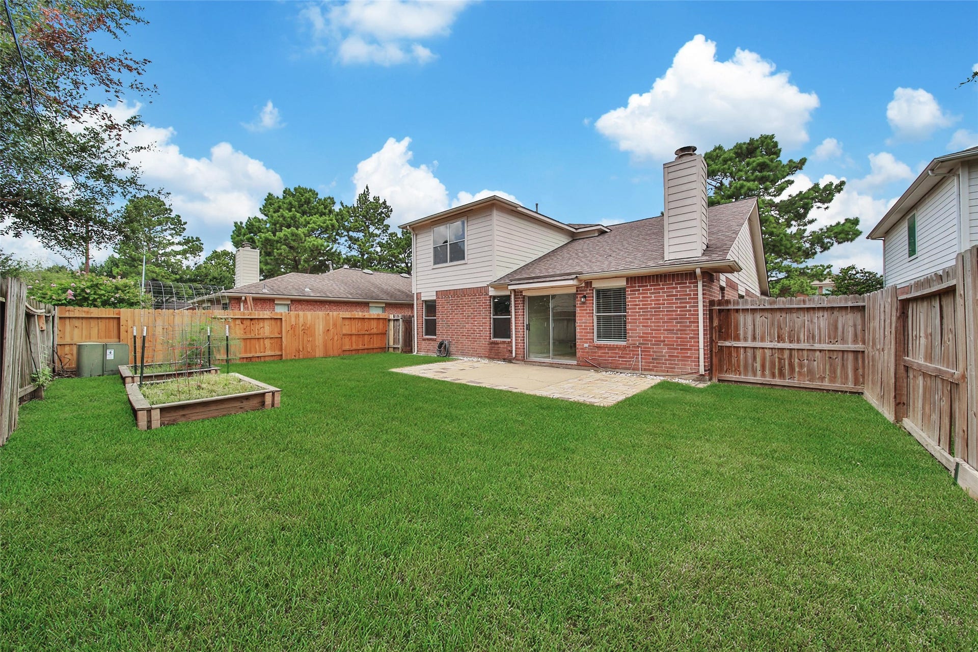 11911 Ezekiel Drive, Tomball, TX 77375 Expansive backyard perfect for spending time with family and friends!