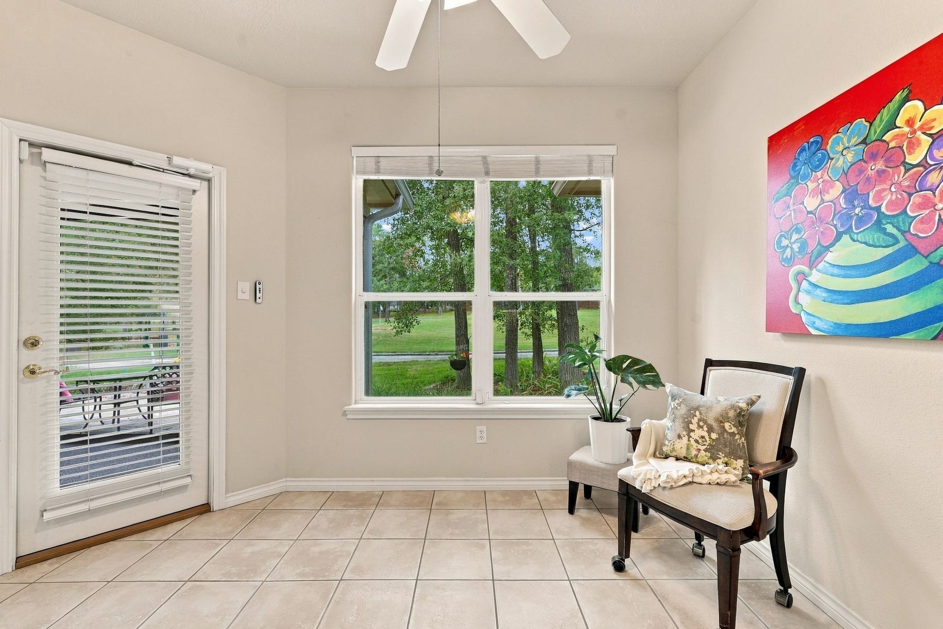 156 April Waters Drive W, Conroe, TX 77356 door on the left leads to the screened in porch.