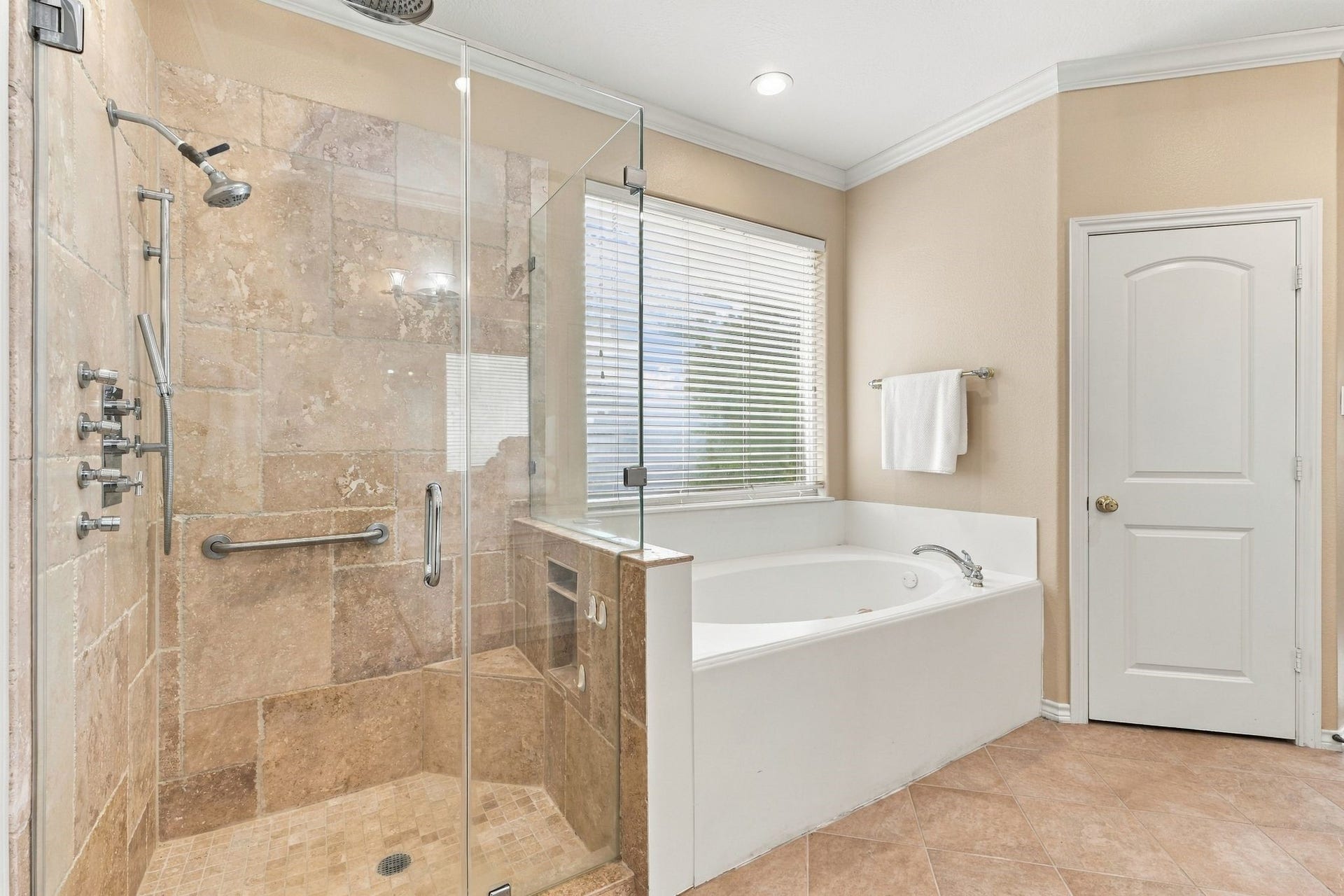 156 April Waters Drive W, Conroe, TX 77356 Spacious walk-in shower and separate tub.