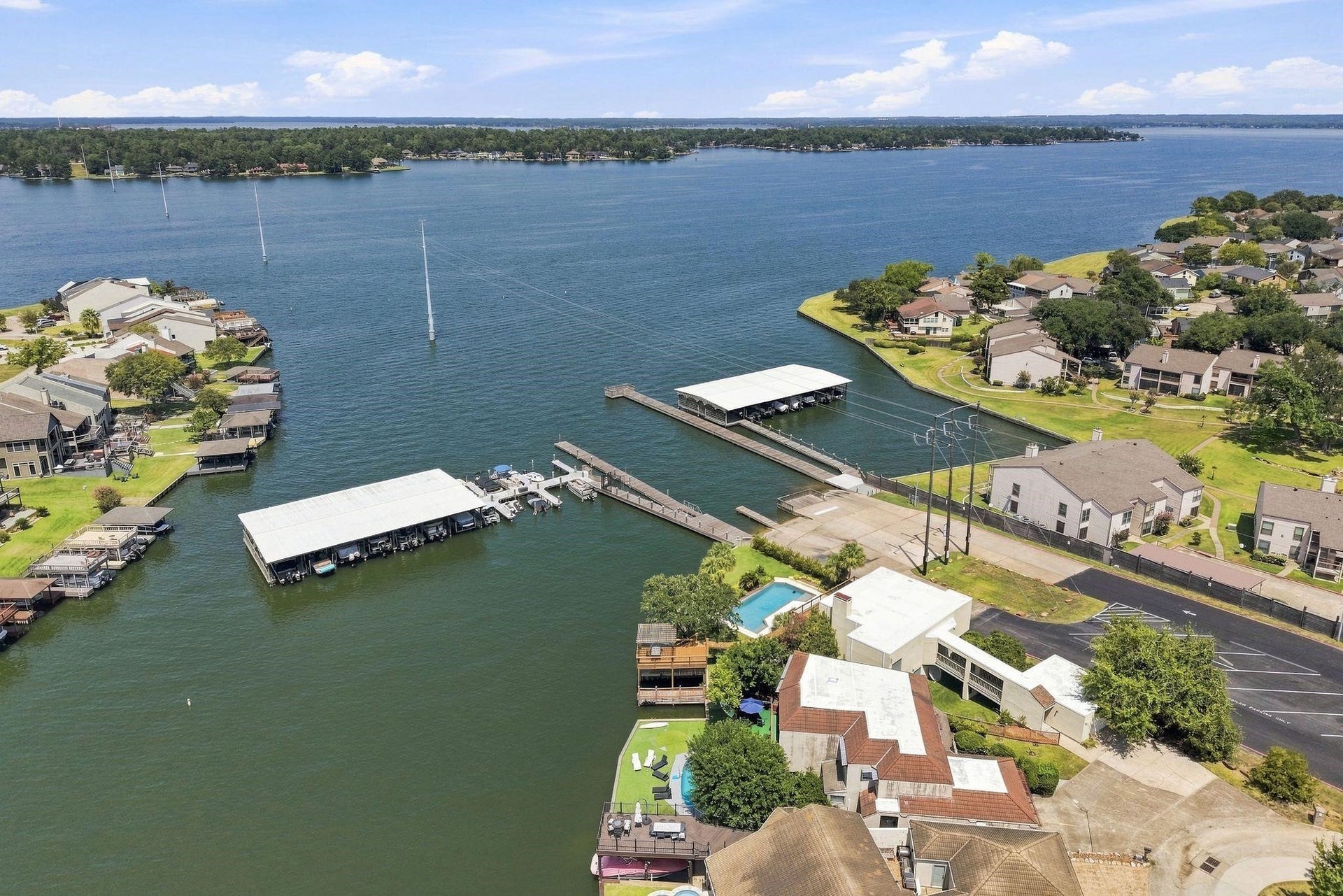 156 April Waters Drive W, Conroe, TX 77356 This community has it all- lake living, golf course, social club, tennis, pickle ball.... What is stopping you?