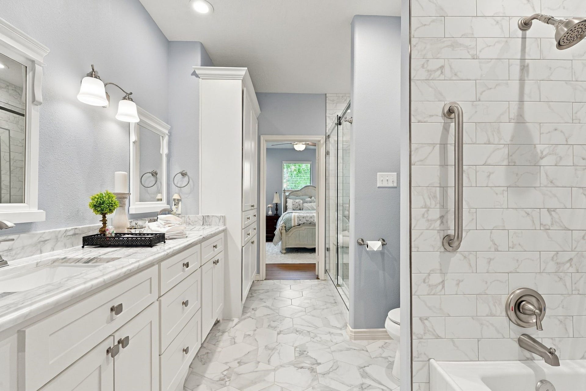 156 April Waters Drive W, Conroe, TX 77356 Double vanities and basins. Notice the amazing builtin cabinets.