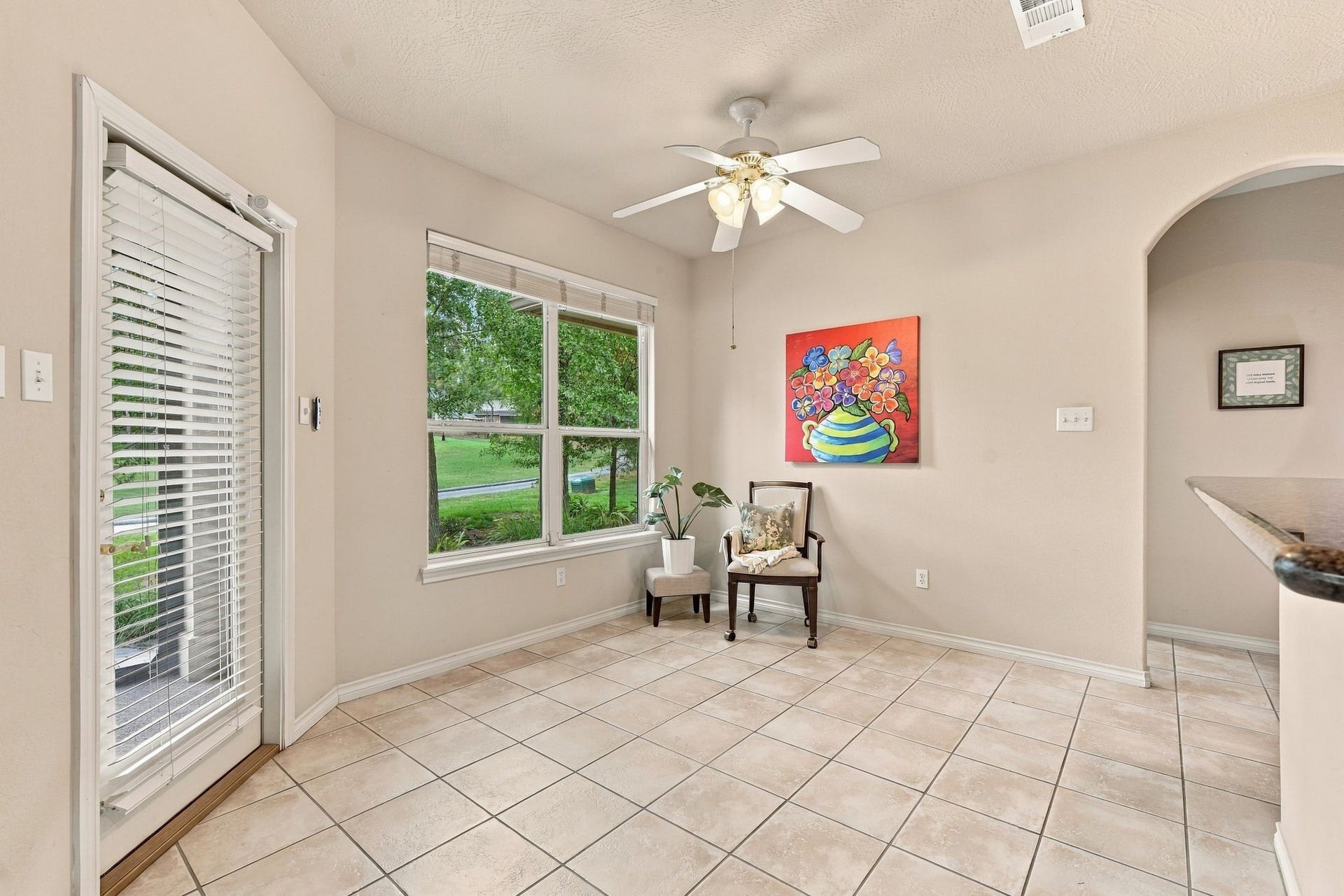 156 April Waters Drive W, Conroe, TX 77356 Breakfast area with a view of the golf course. Light, bright and cheery space.