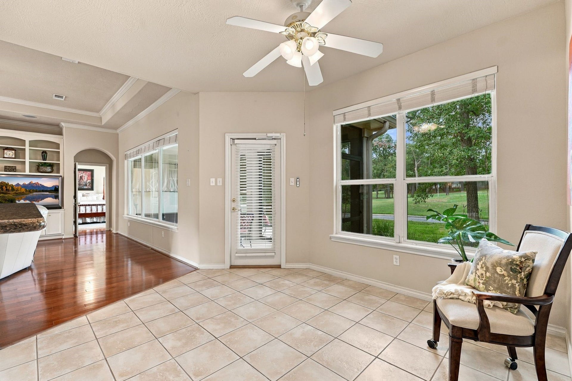 156 April Waters Drive W, Conroe, TX 77356 This space offers an opening to the living room. So convenient when entertaining with friends an family!