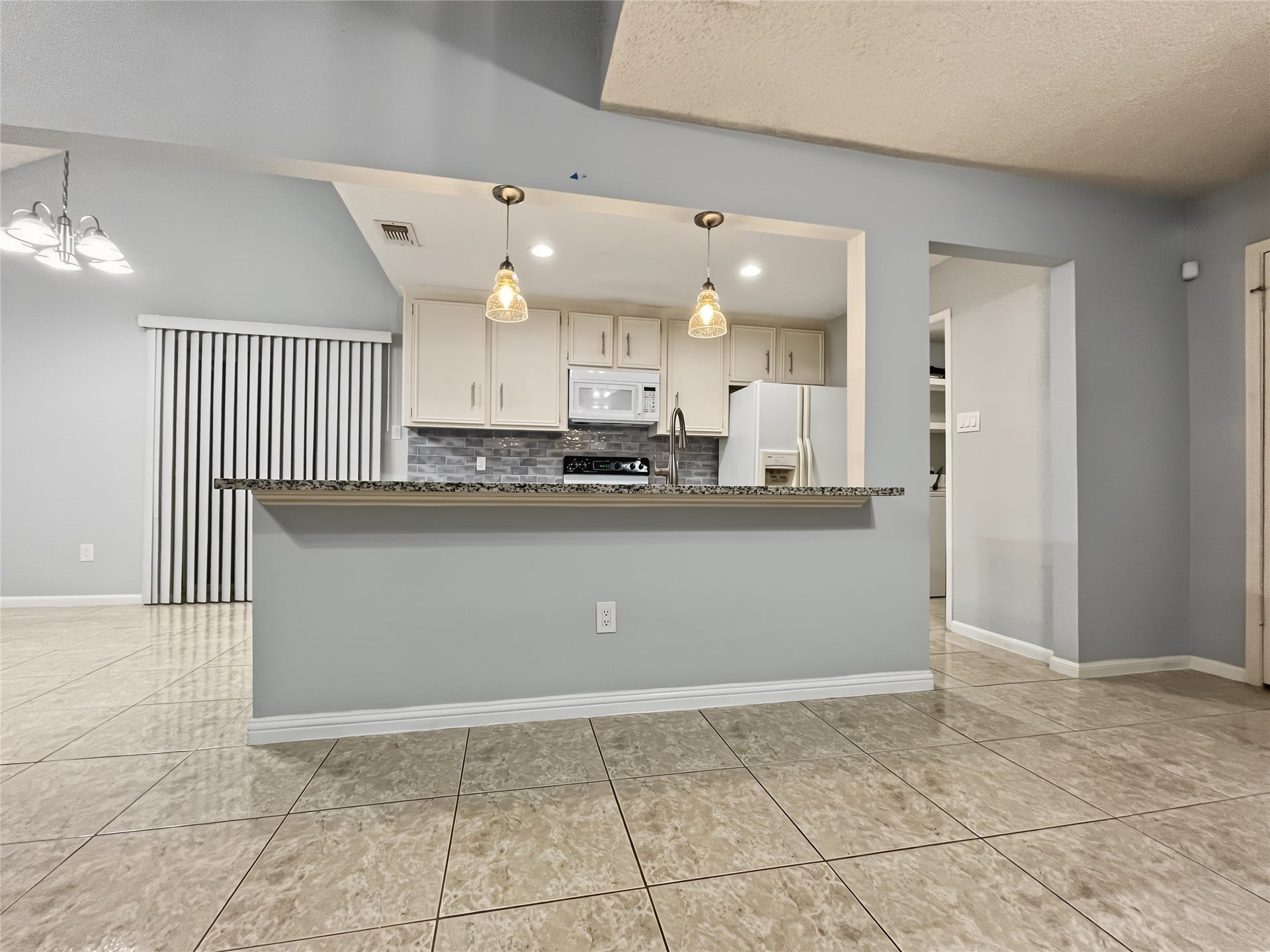 13768 Hollowgreen Drive, #510, Houston, TX 77082 Great view of the open kitchen loaded with granite countertops.